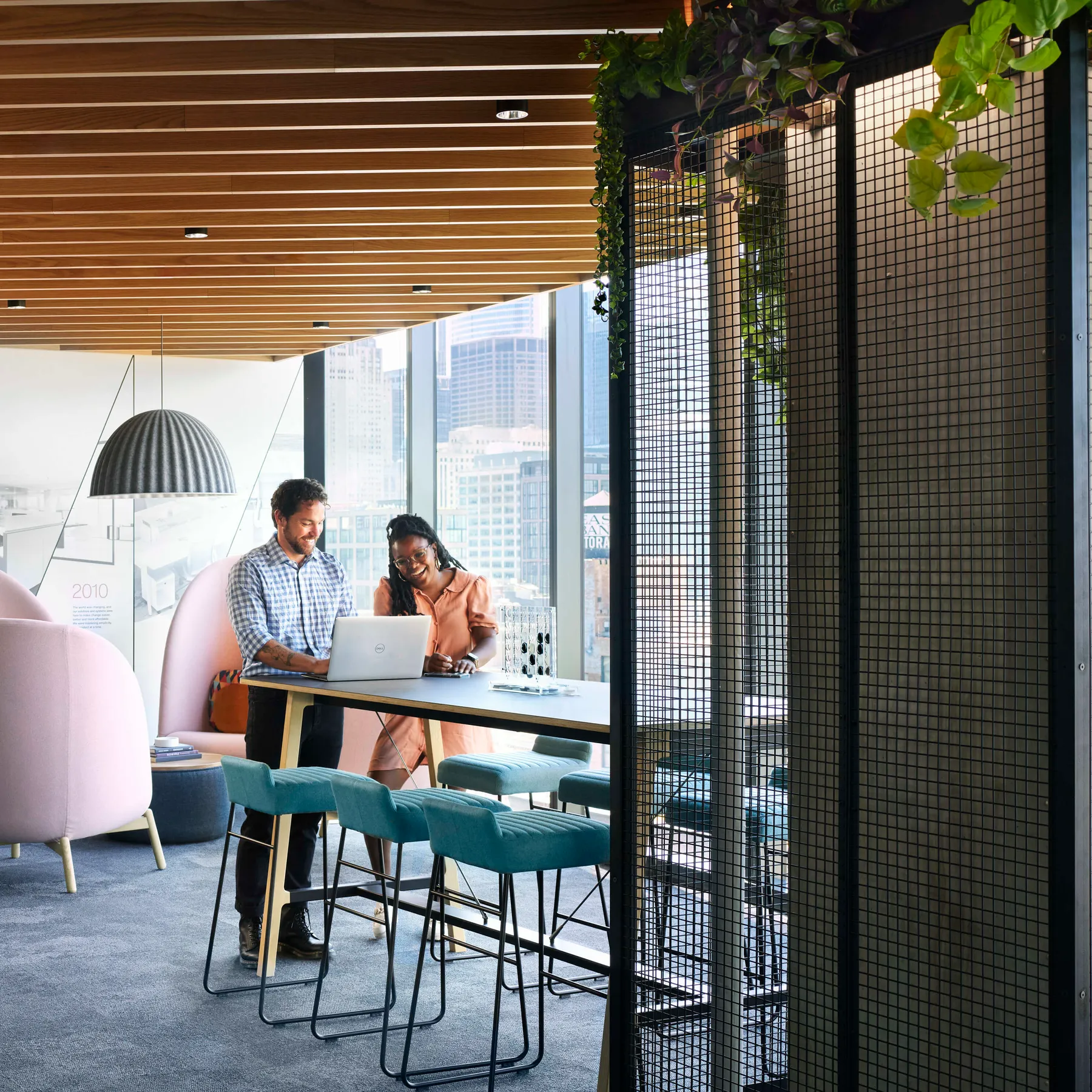 custom steel column covers with metal mesh infill by Icon Modern