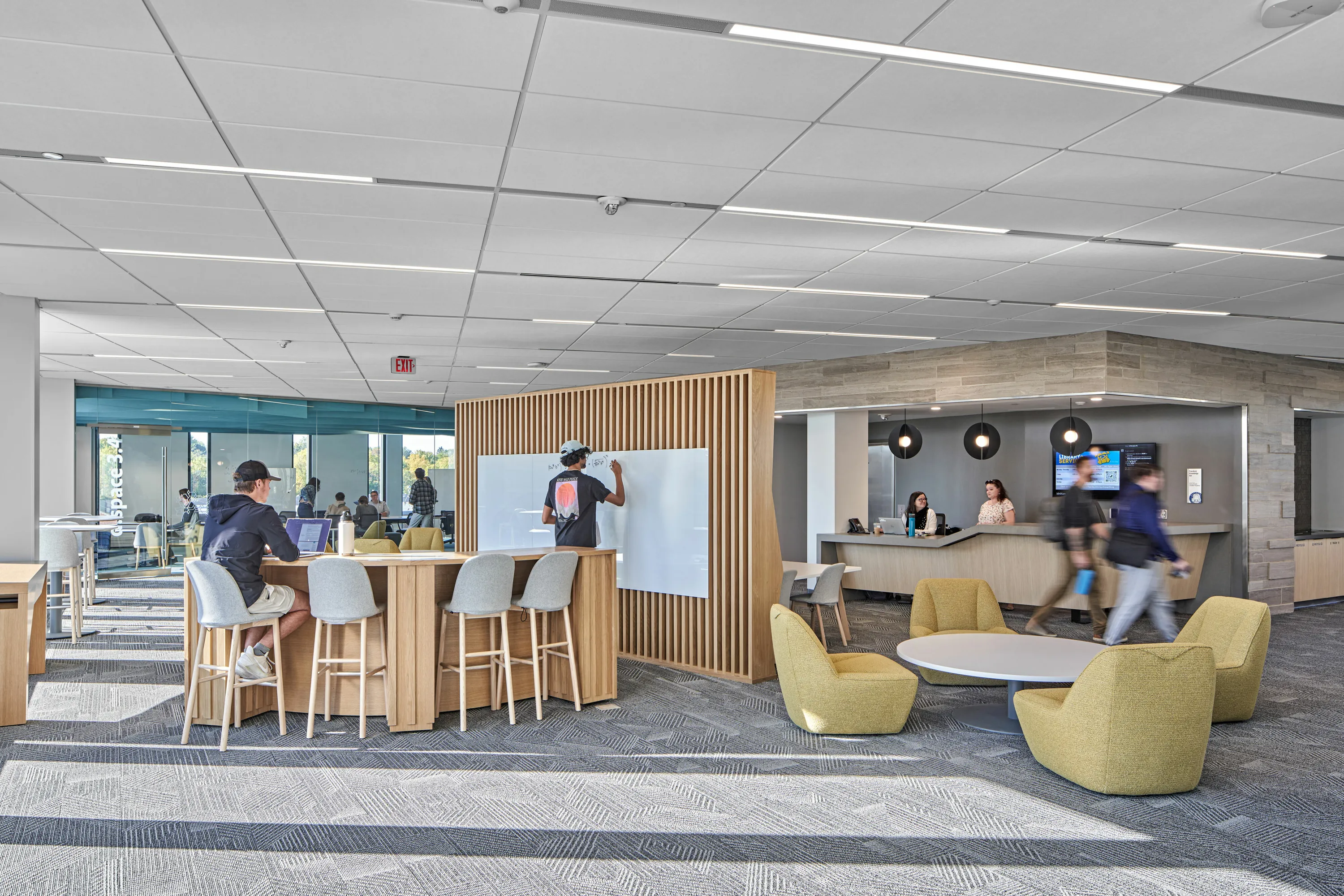 custom oak slat space divider with whiteboard by Icon Modern