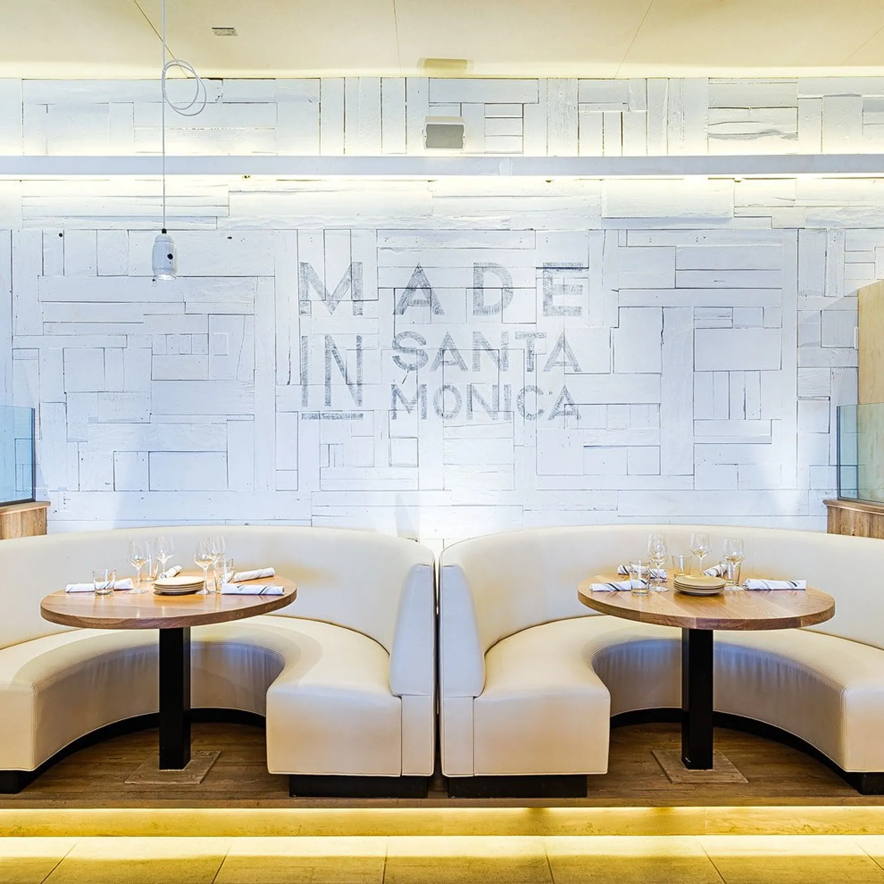 custom restaurant tables in urban oak round by Icon Modern