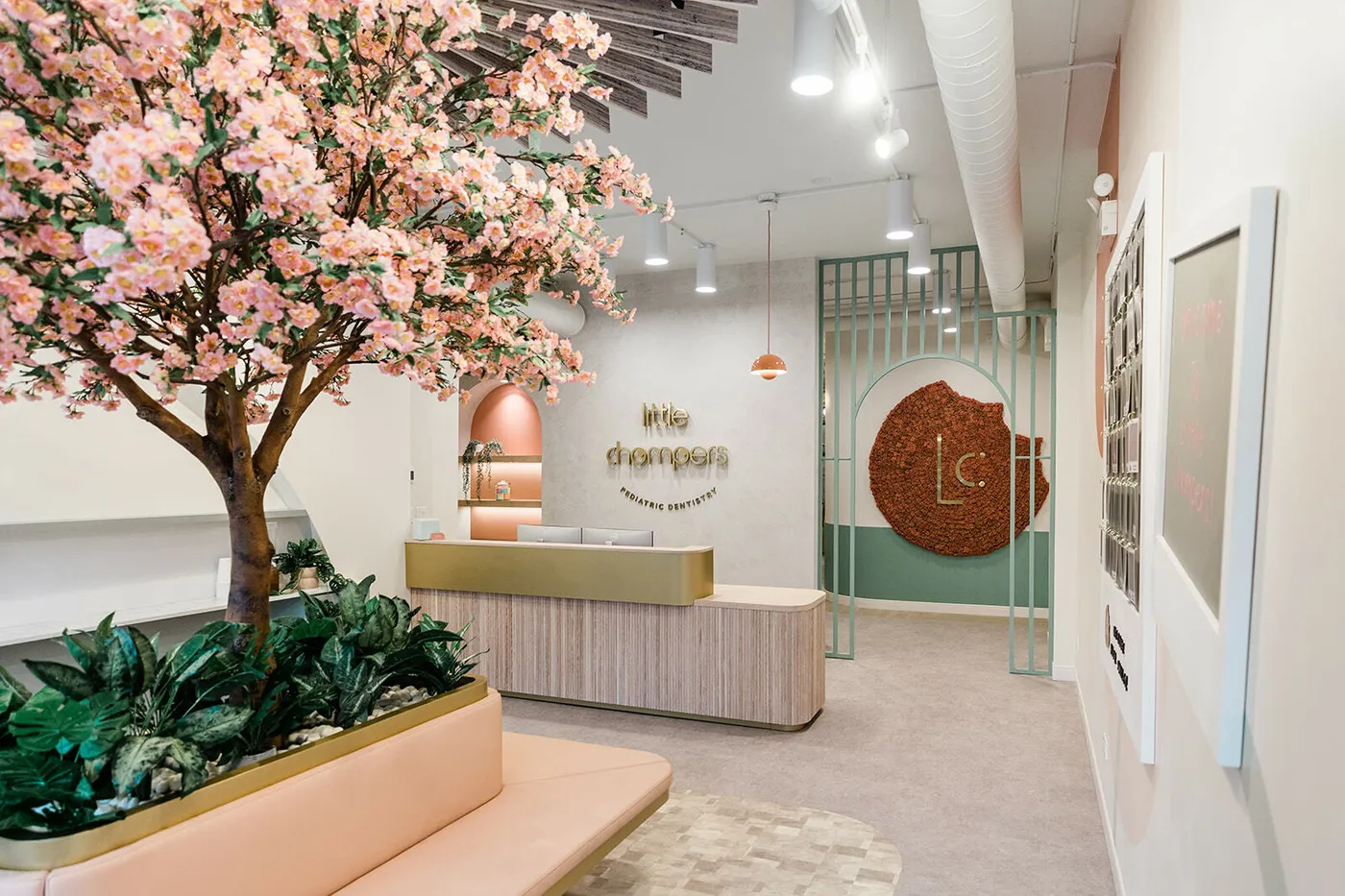 custom reception desk with bench and slatted archway entry by Icon Modern