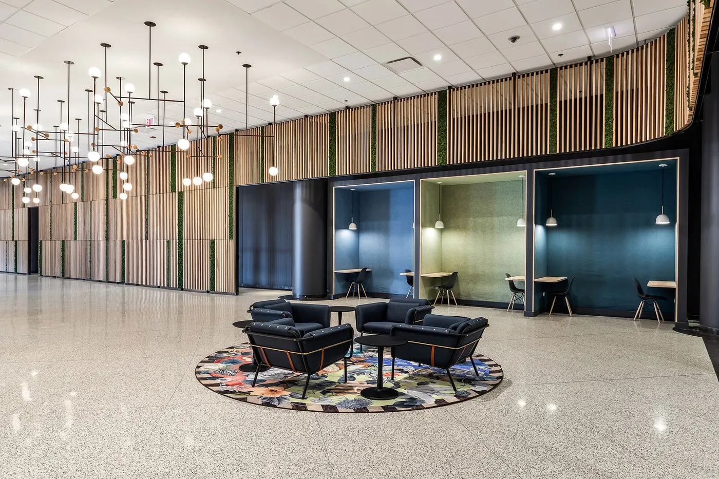 custom wall treatments in urban ash slats with faux plants by Icon Modern