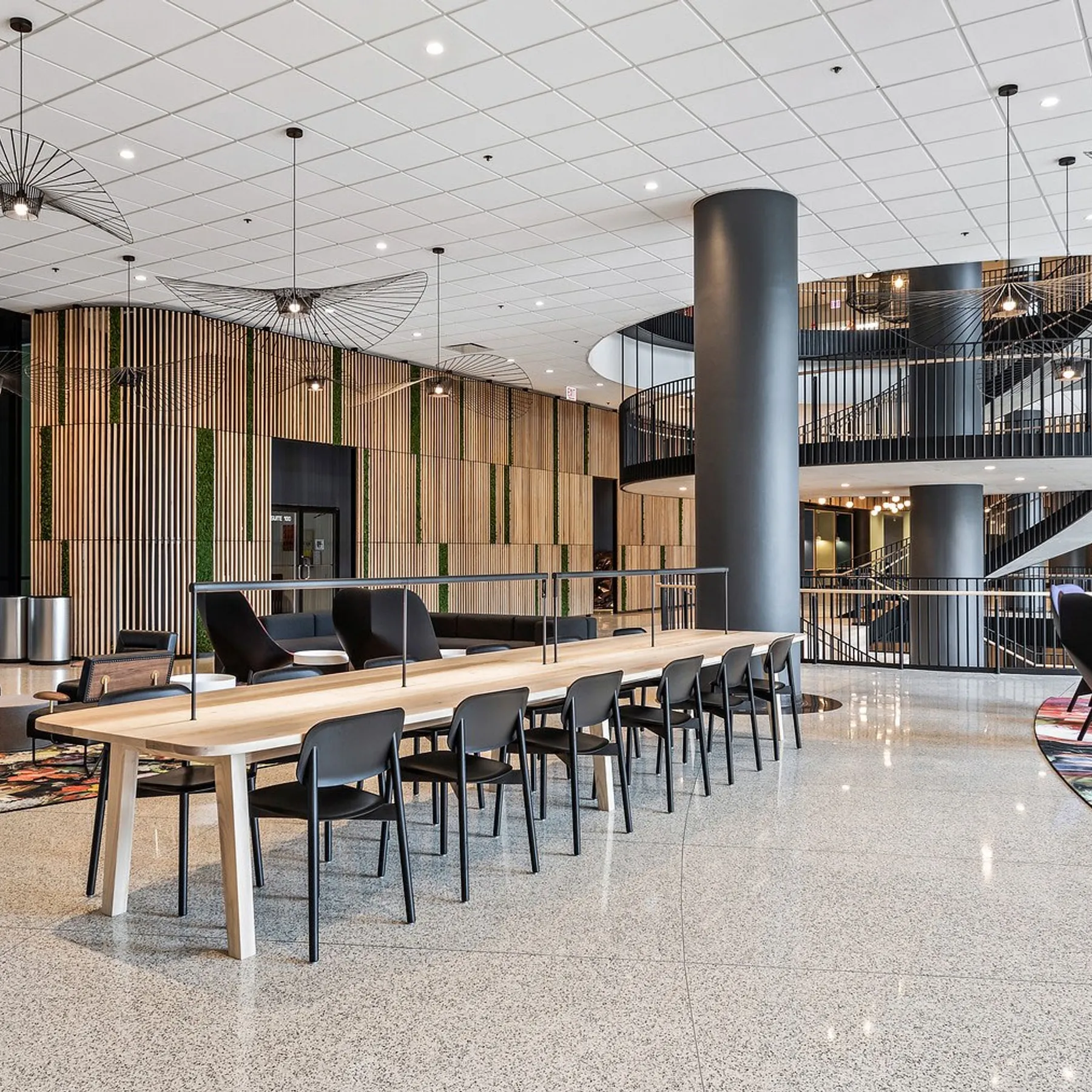 custom wall treatment in urban ash slats with faux plants by Icon Modern