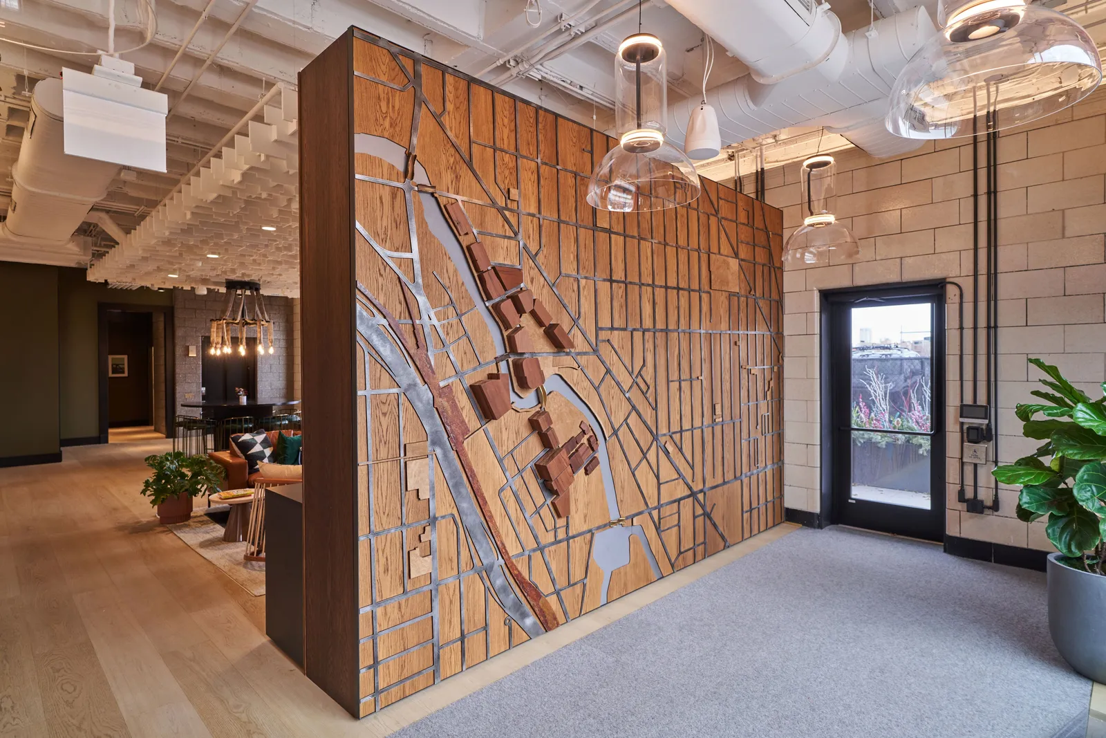 custom map using salvaged wood, steel, brass and leather by Icon Modern