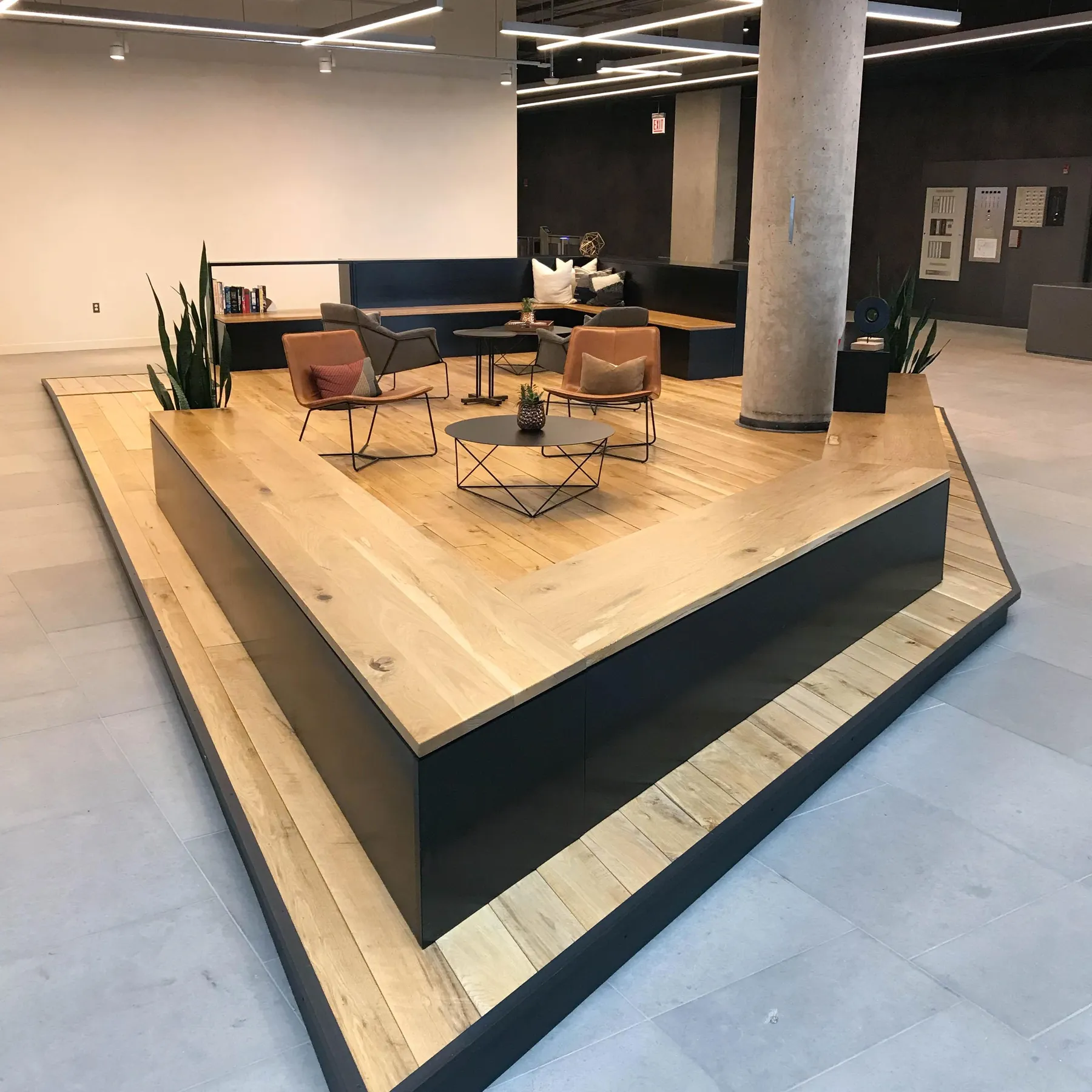 custom lobby platform in urban oak & steel by Icon Modern