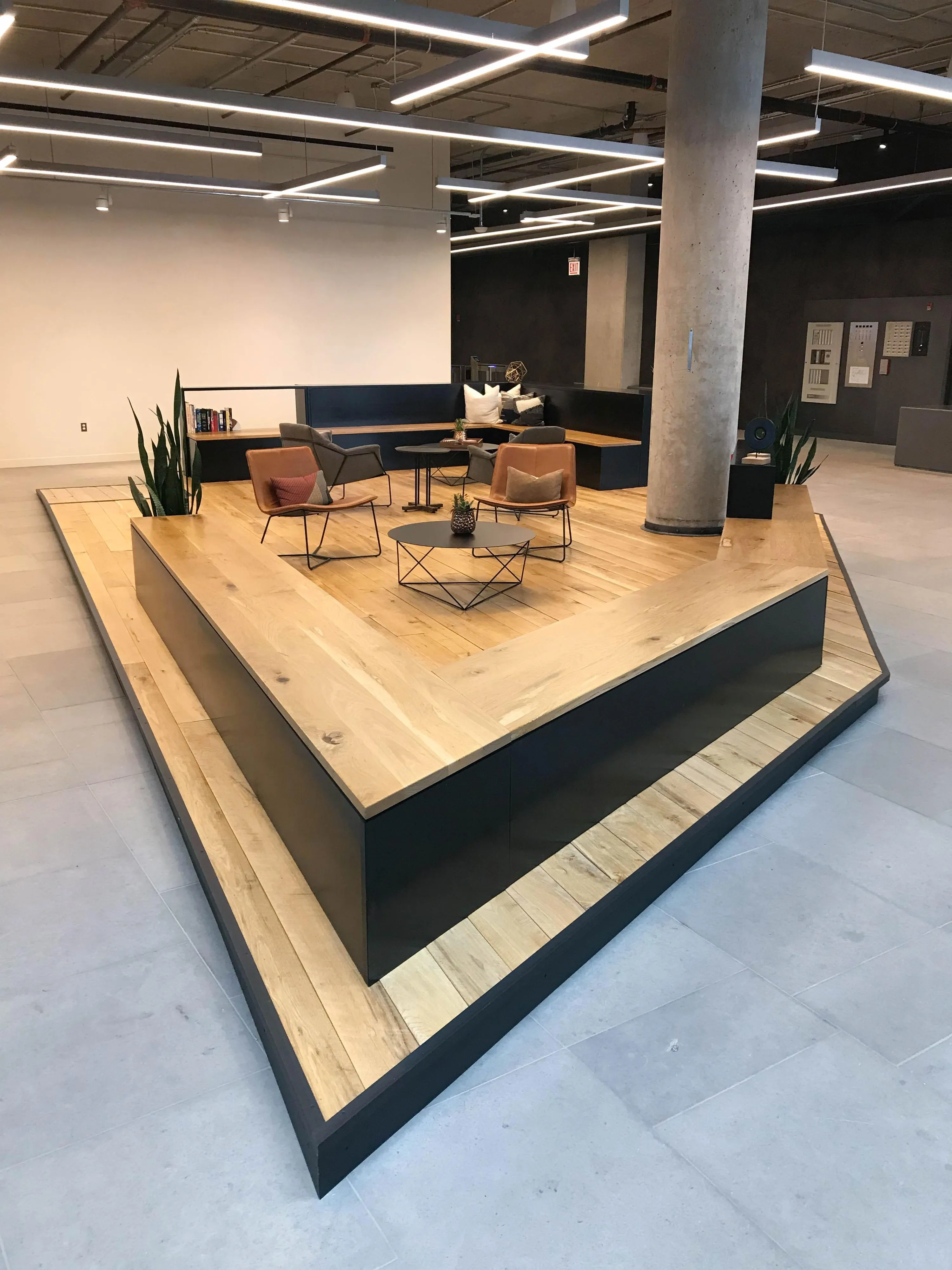 custom lobby platform in urban oak & steel by Icon Modern