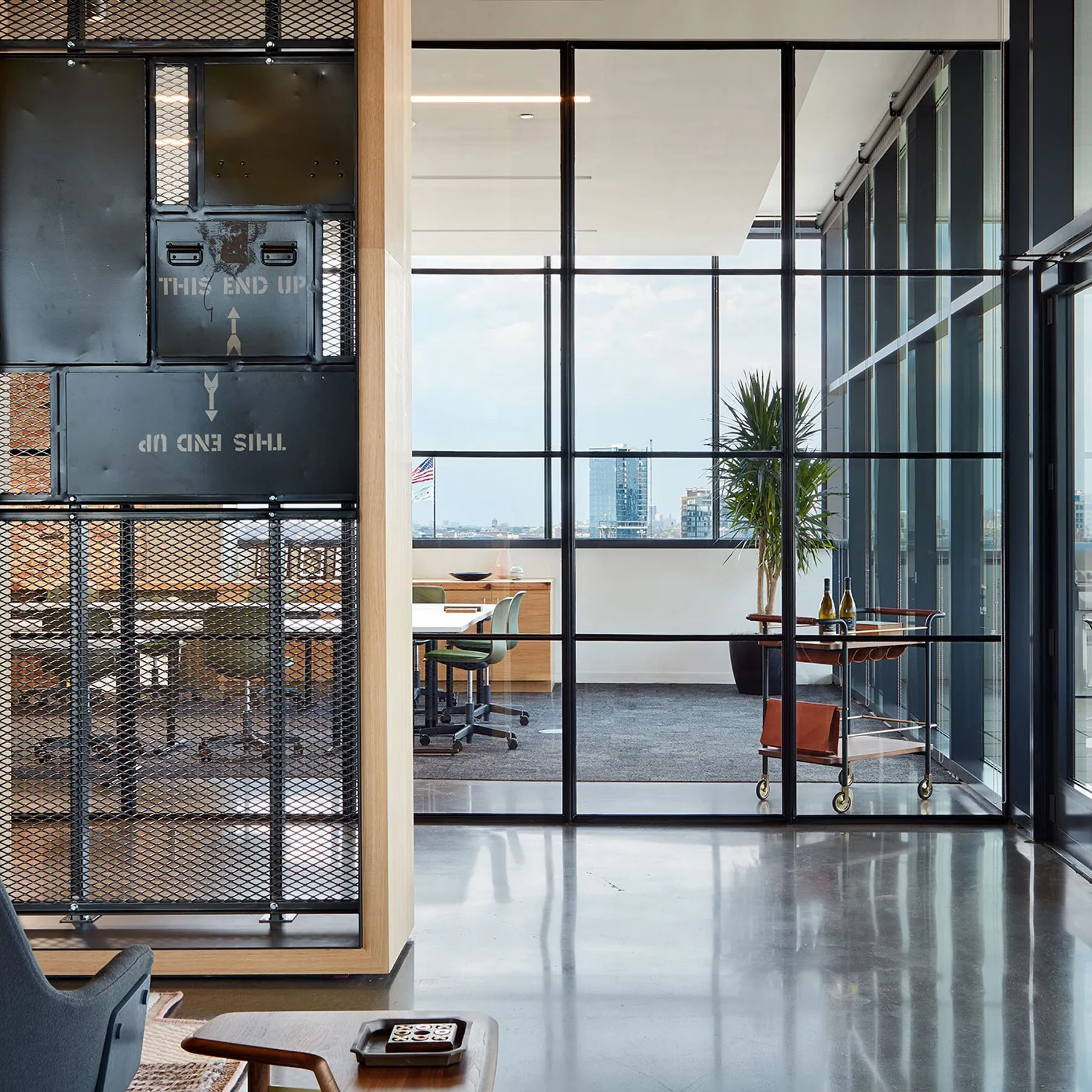 custom screen wall made from reclaimed parachute boxes by Icon Modern