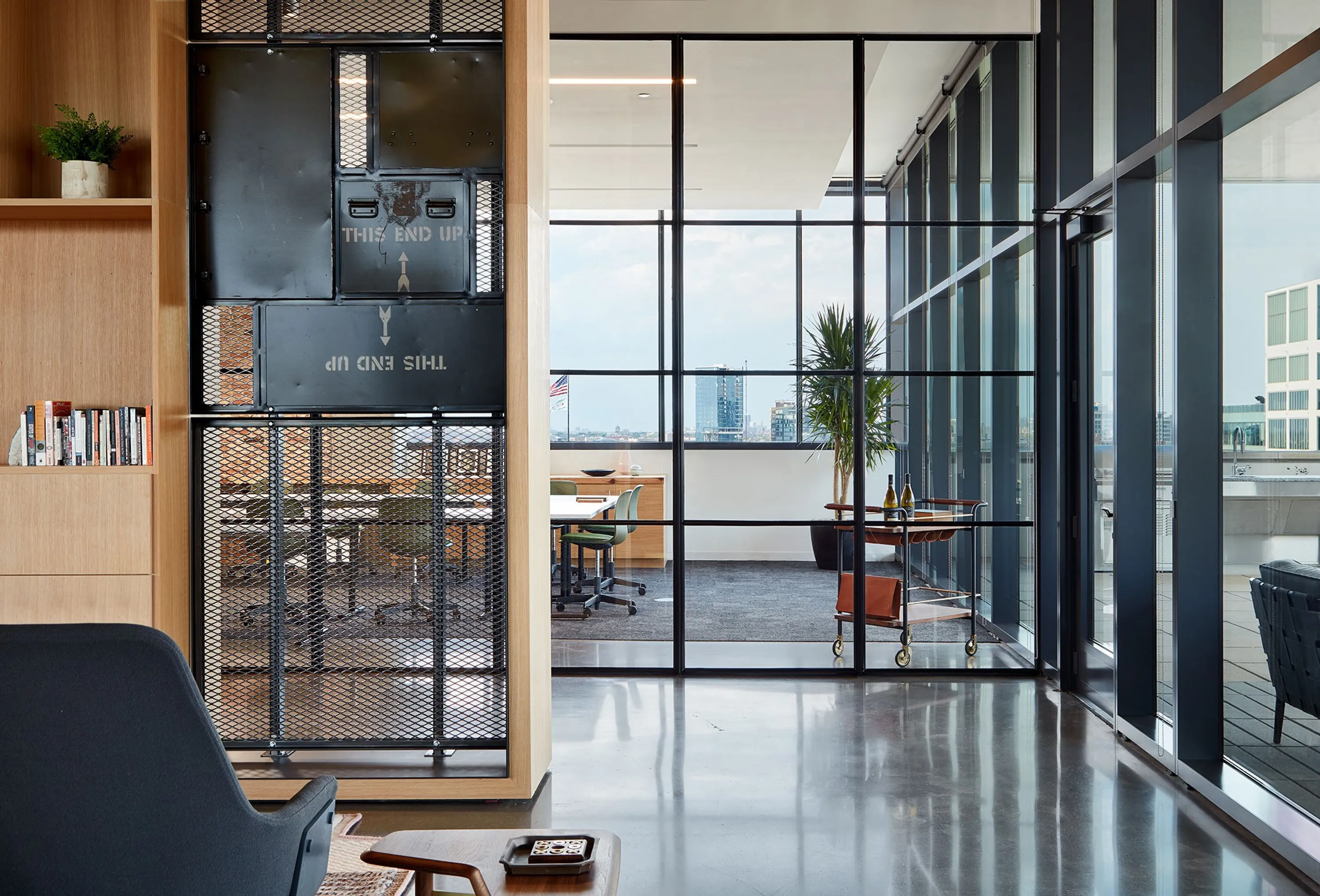 custom screen wall made from reclaimed parachute boxes by Icon Modern