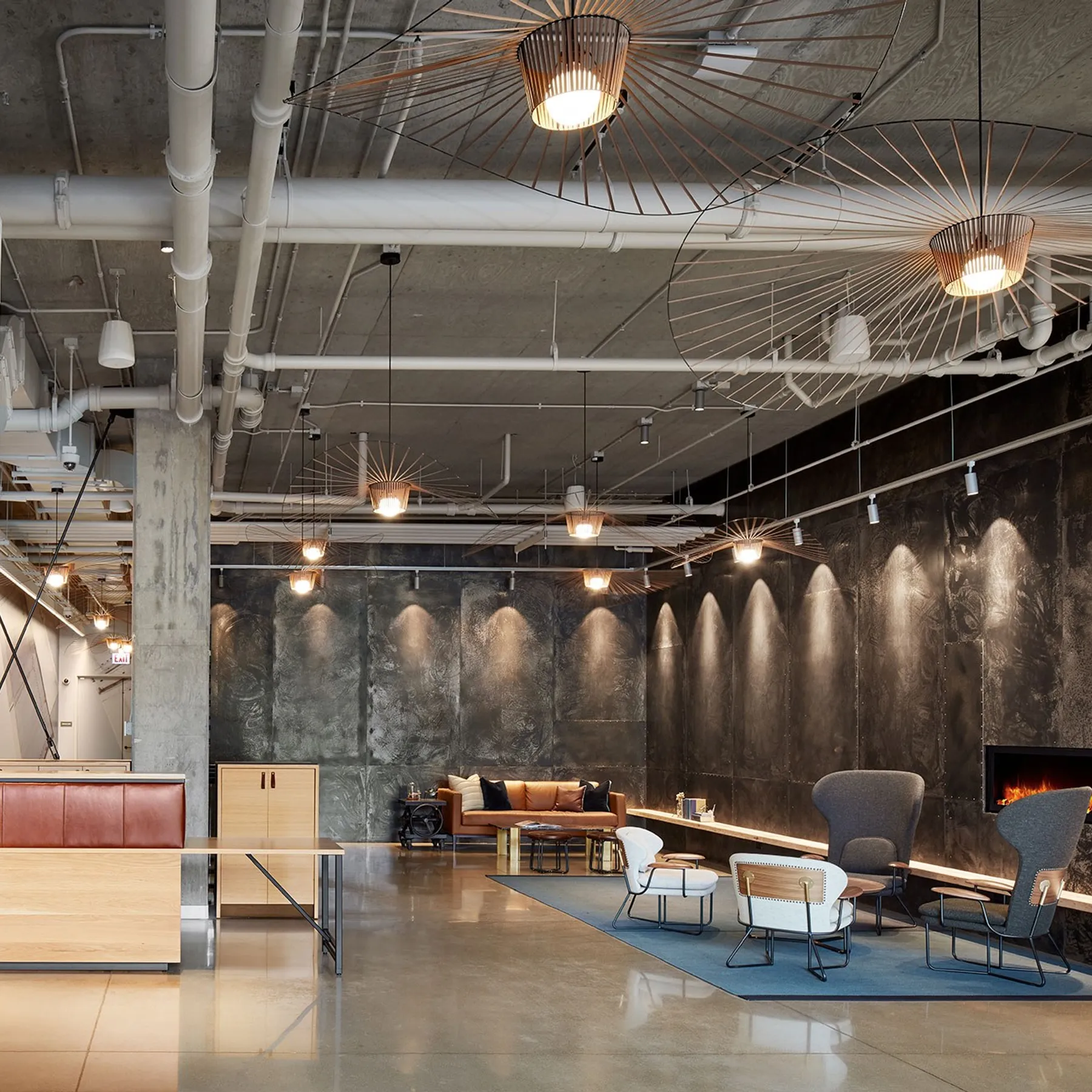 custom reception desk in urban oak with leather accents by Icon Modern