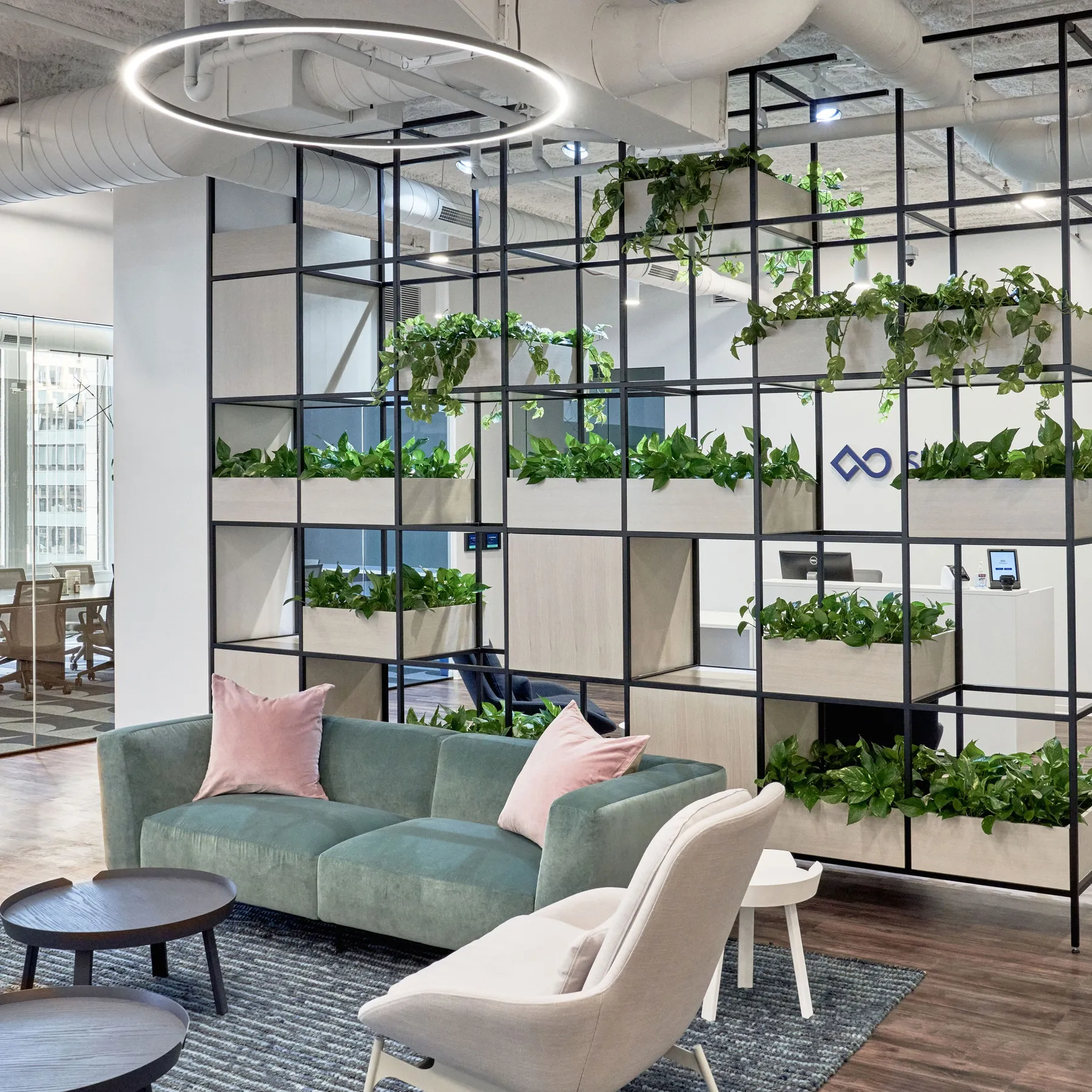 custom space divider in steel with plants by Icon Modern