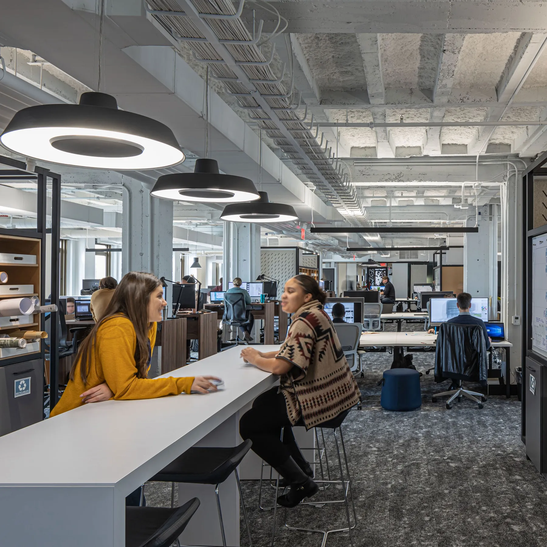 custom working pods in hot rolled steel tubes with whiteboards by Icon Modern