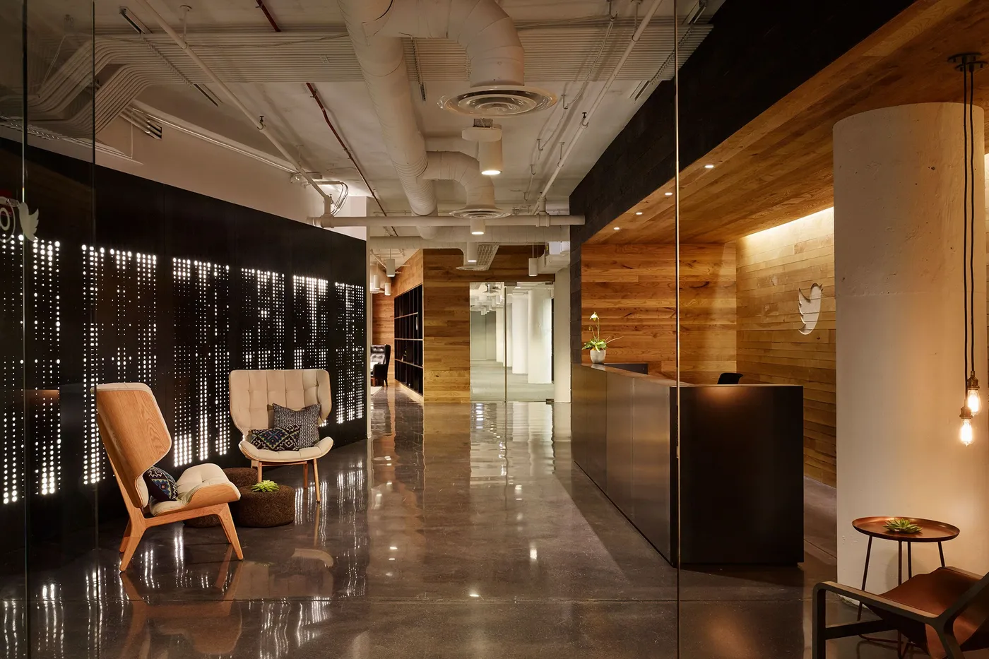 custom cladding in urban ash with CNC logo by Icon Modern