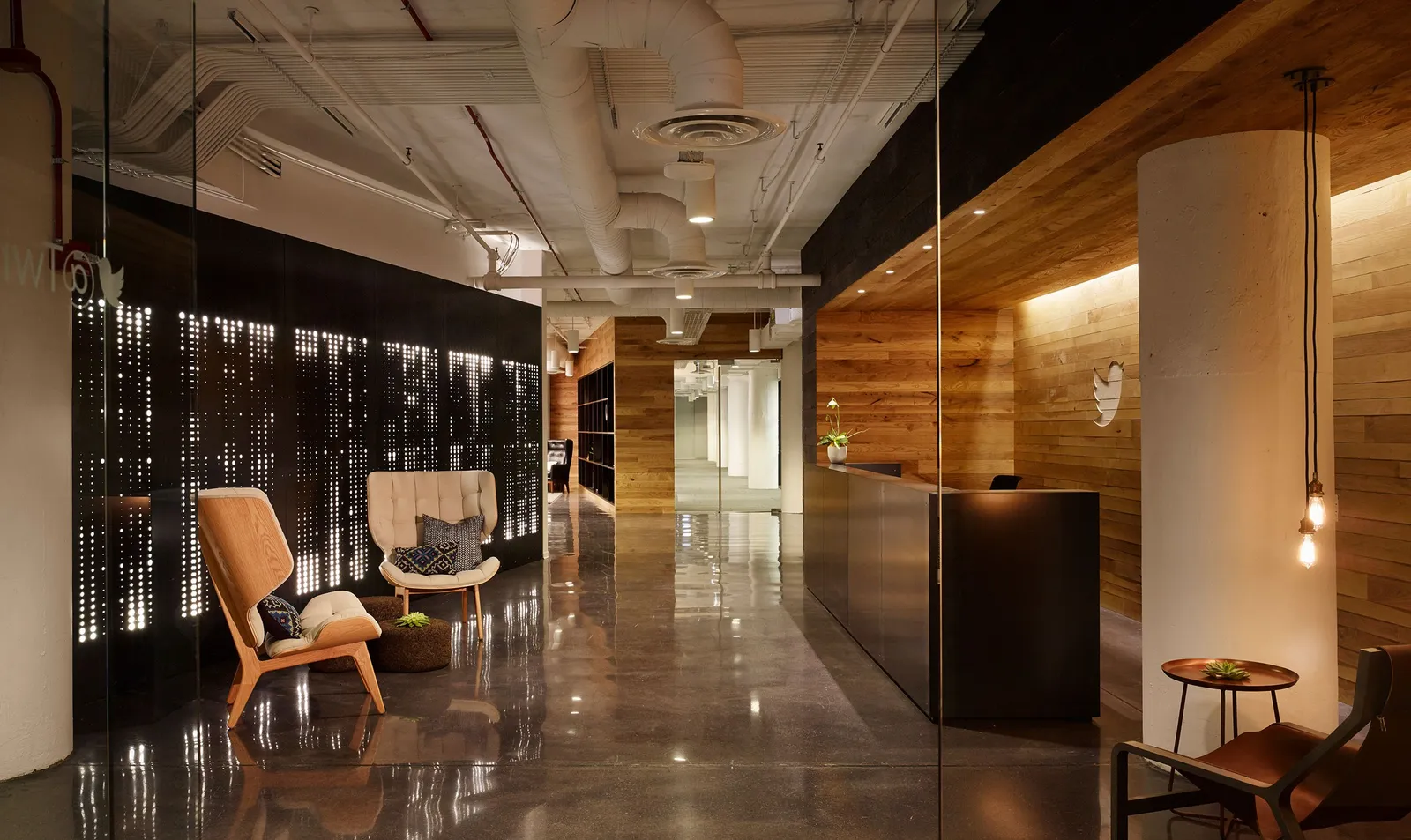 custom cladding in urban ash with CNC logo by Icon Modern