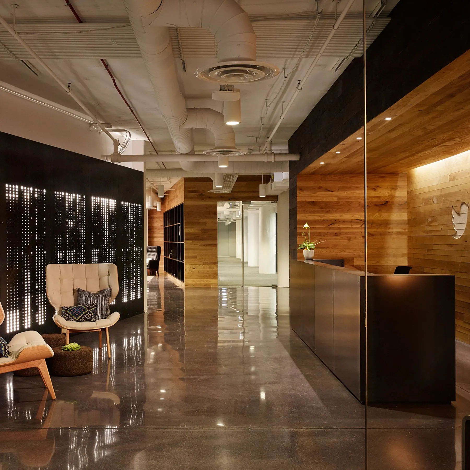 custom cladding in urban ash with CNC logo by Icon Modern