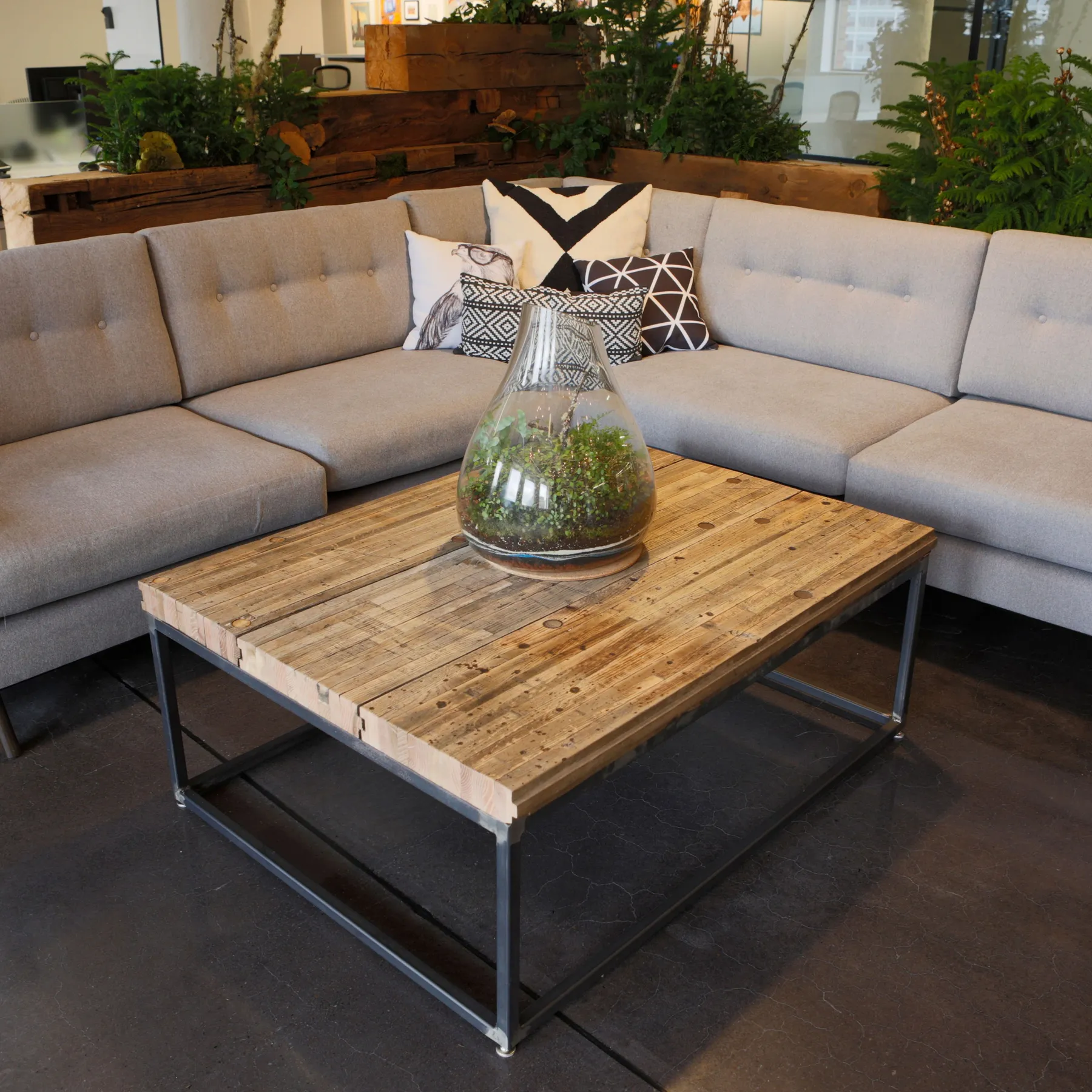custom coffee table made from reclaimed boxcar flooring by Icon Modern