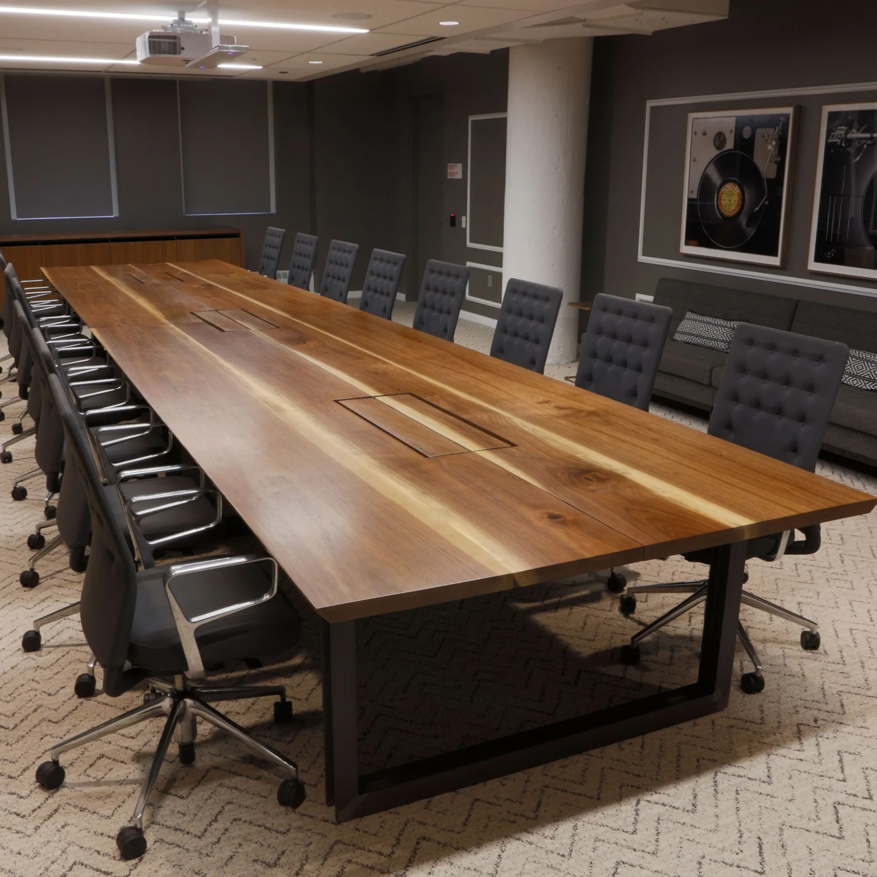 custom conference table in walnut with power/data by Icon Modern