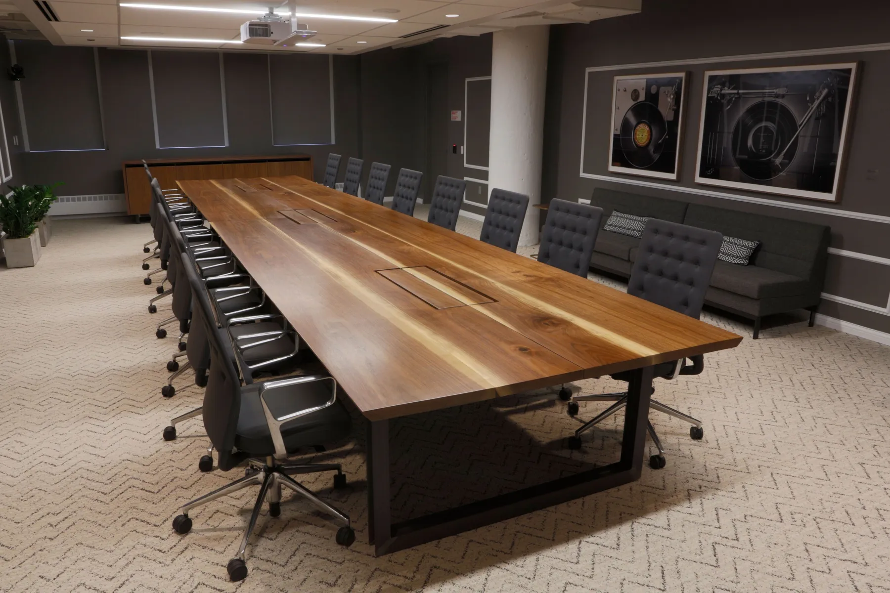 custom conference table in walnut with power/data by Icon Modern