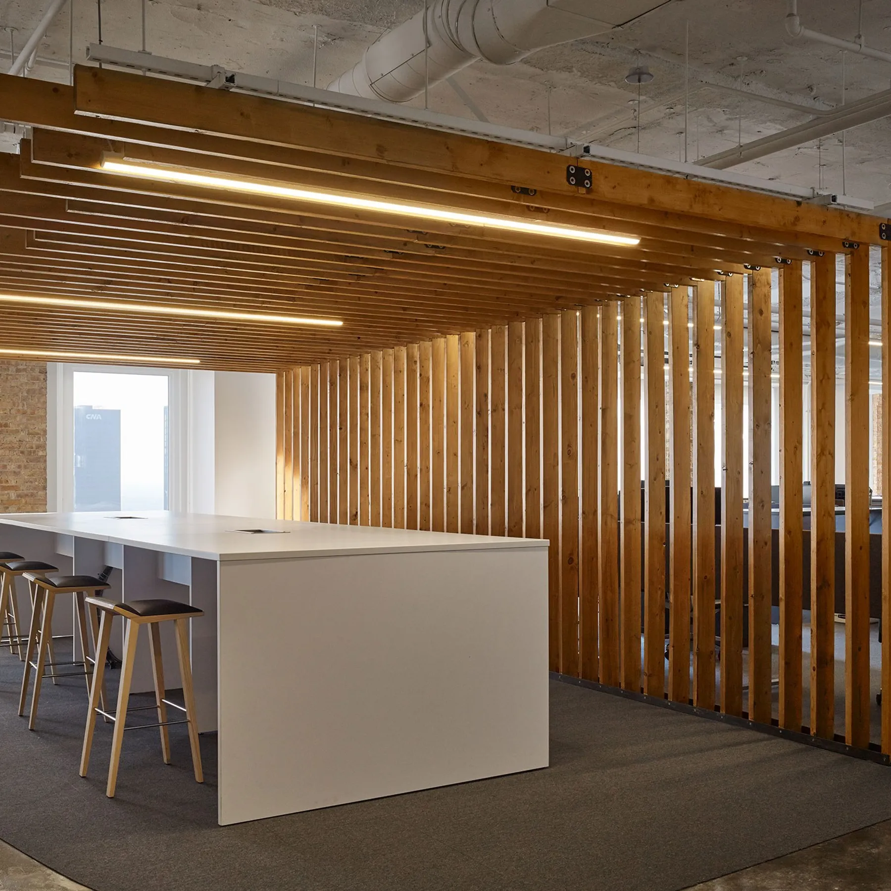 custom space divider in old growth fir slats by Icon Modern