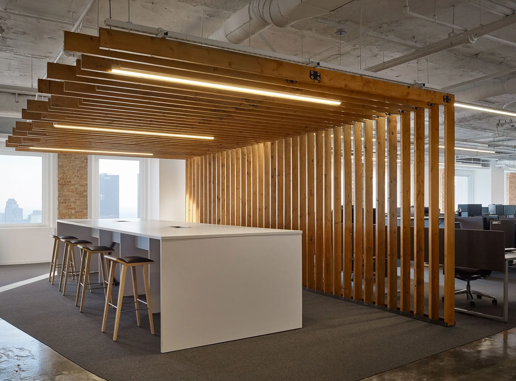 custom space divider in old growth fir slats by Icon Modern