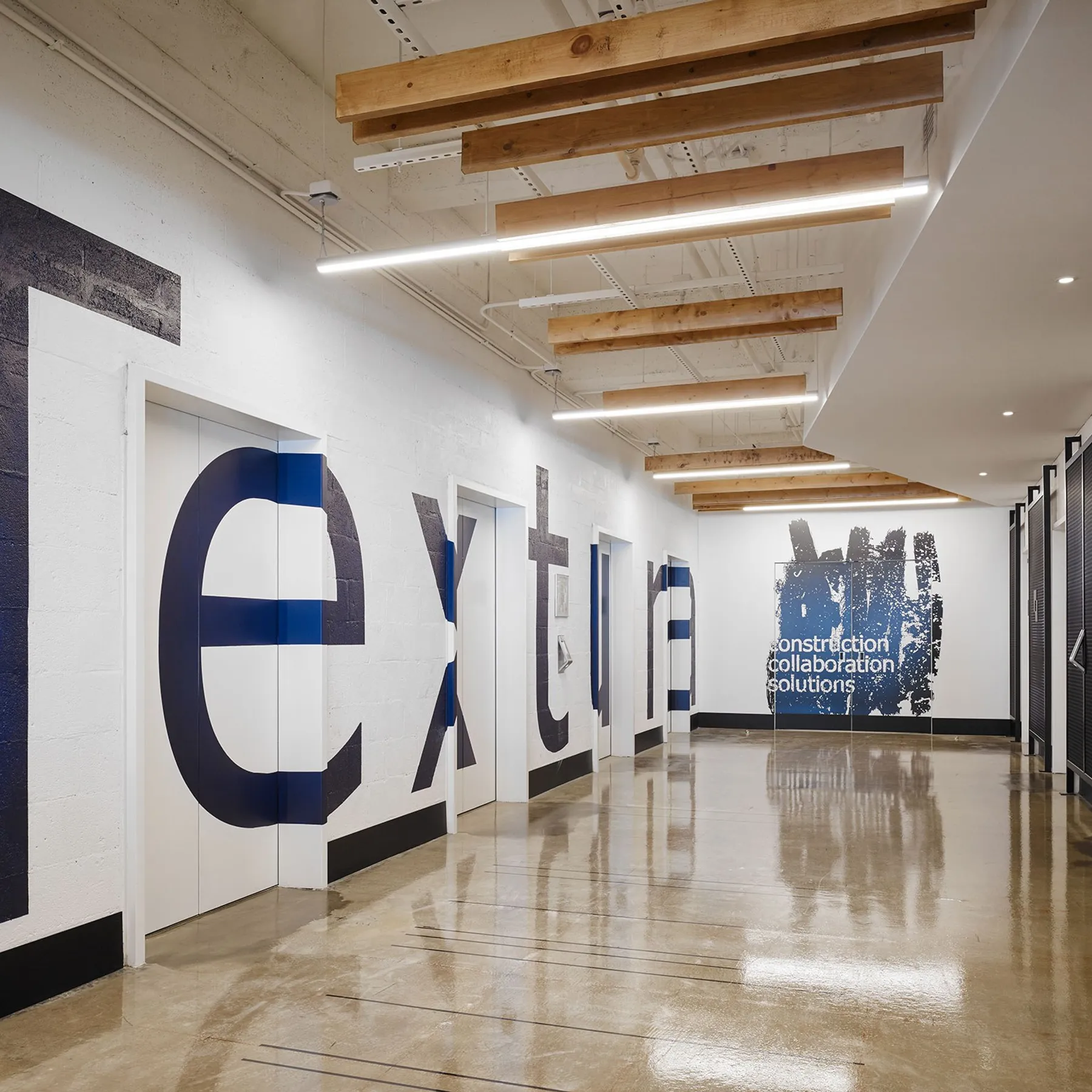 custom wall treatment in expanded metal infill & branding by Icon Modern