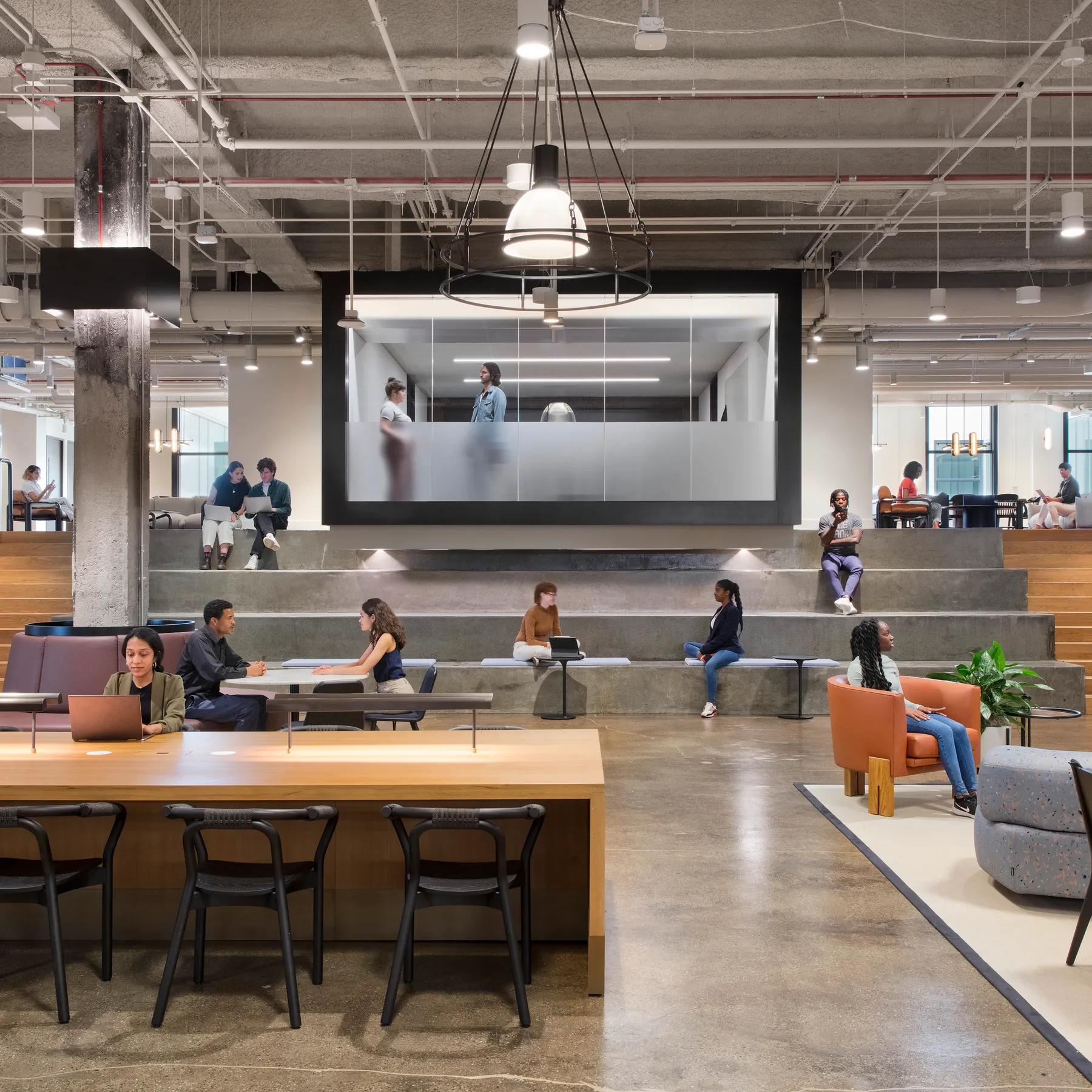 custom oak veneer library table with power units and wireless charging station by Icon Modern