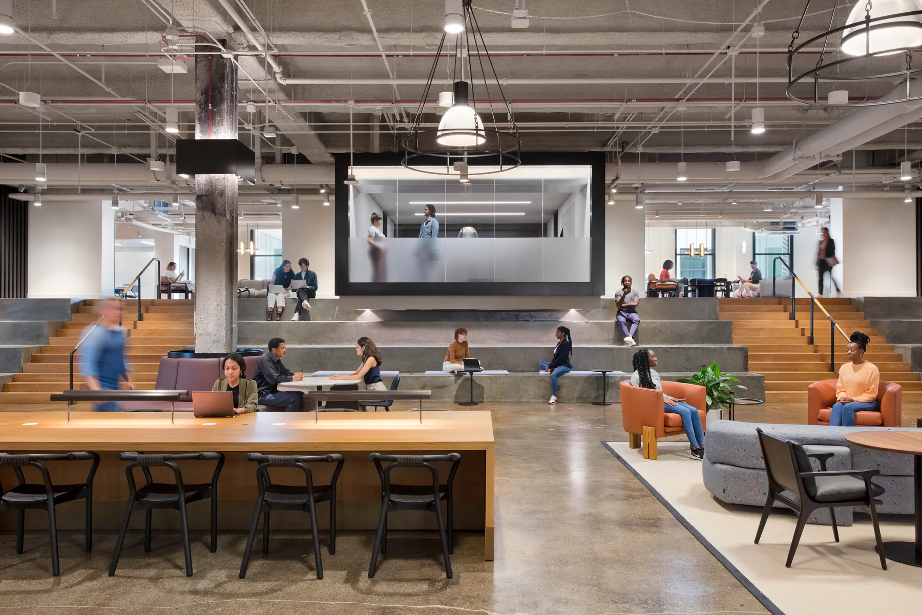 custom oak veneer library table with power units and wireless charging station by Icon Modern
