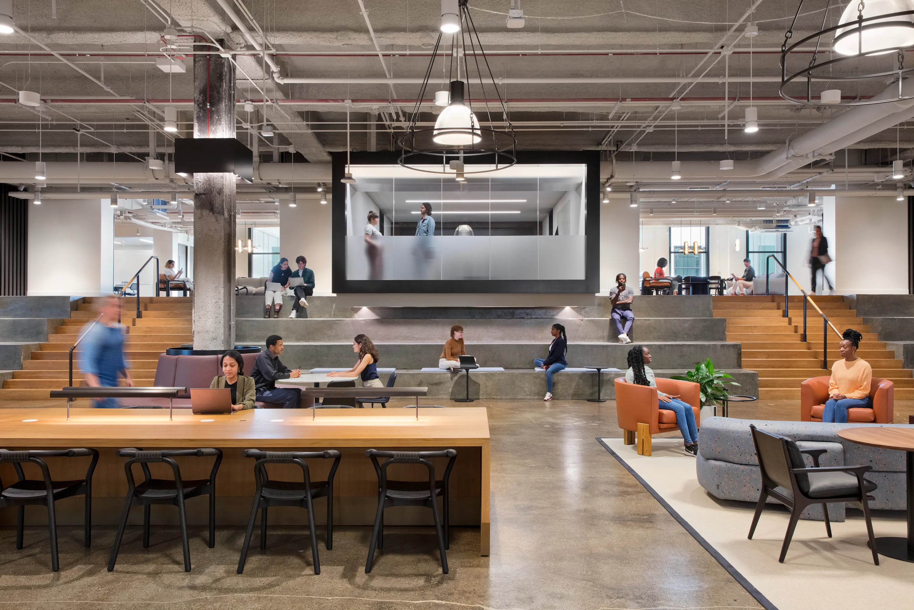 custom oak veneer library table with power units and wireless charging station by Icon Modern