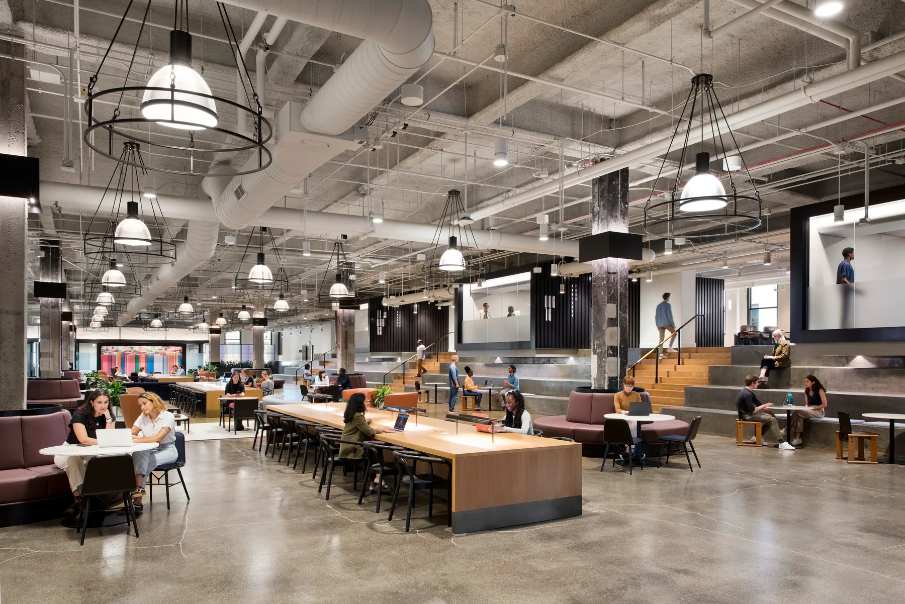 custom library table in oak veneer with power units by Icon Modern