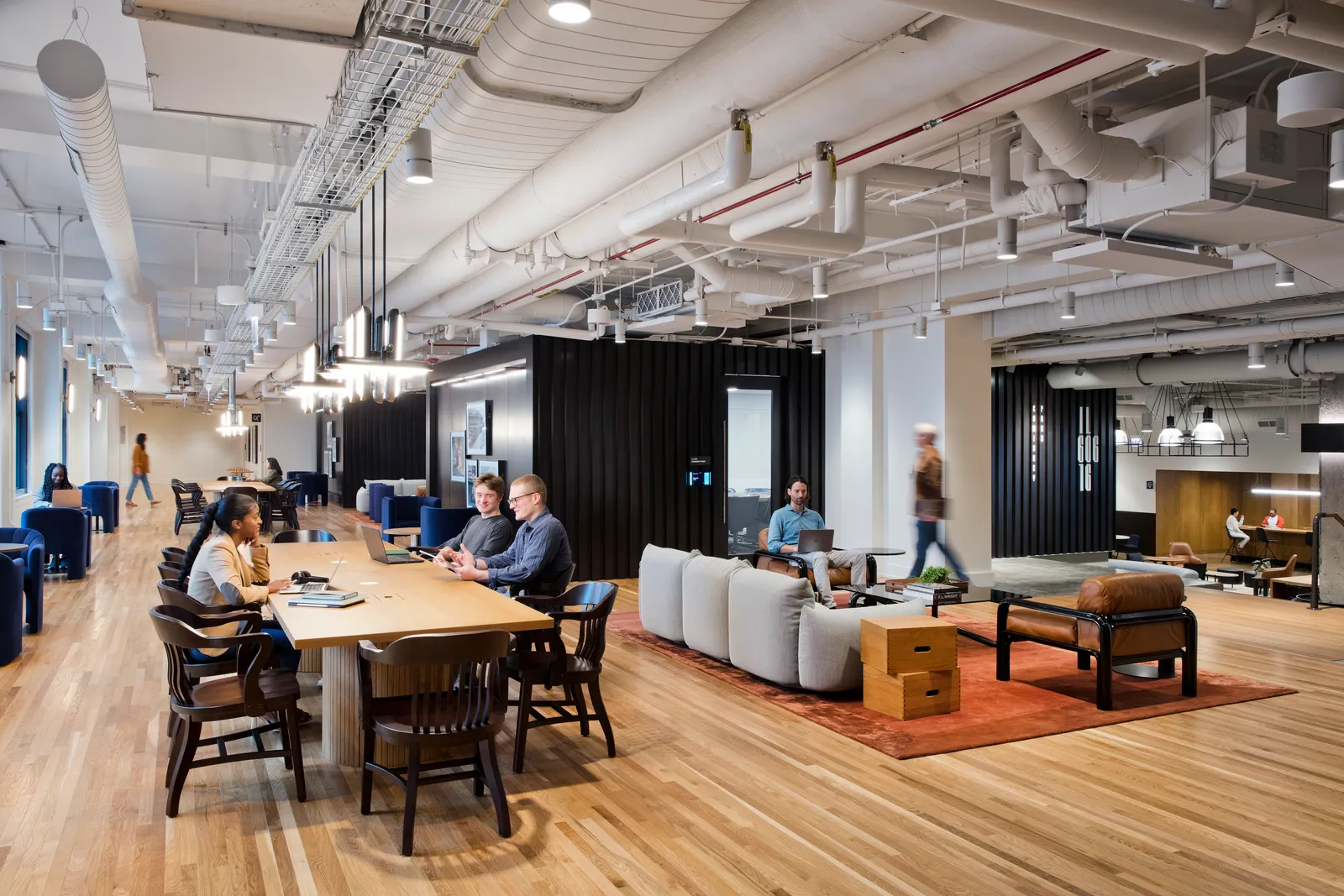 custom conference table in oak veneer with tambour drum base by Icon Modern