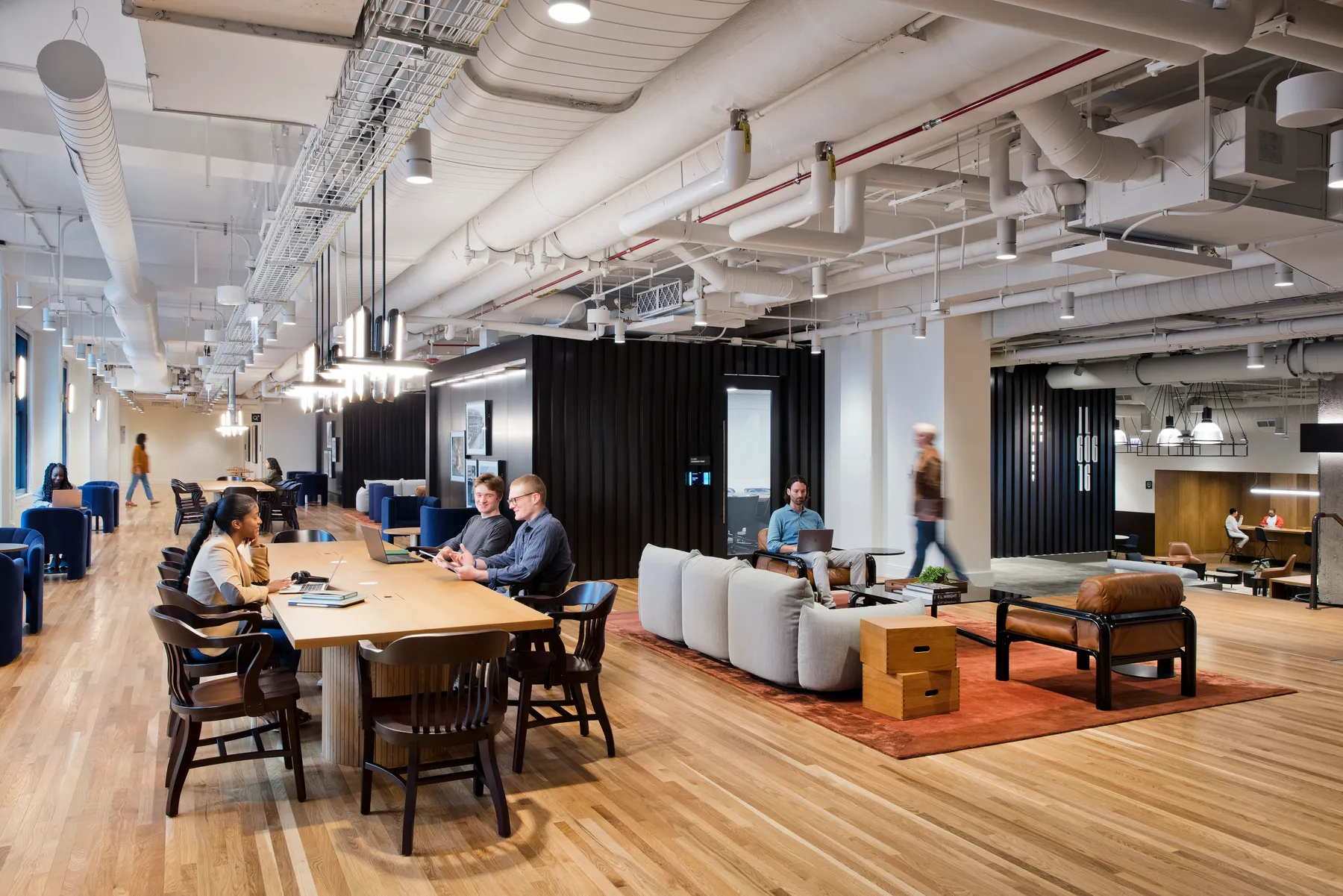 custom conference table in oak veneer with tambour drum base by Icon Modern