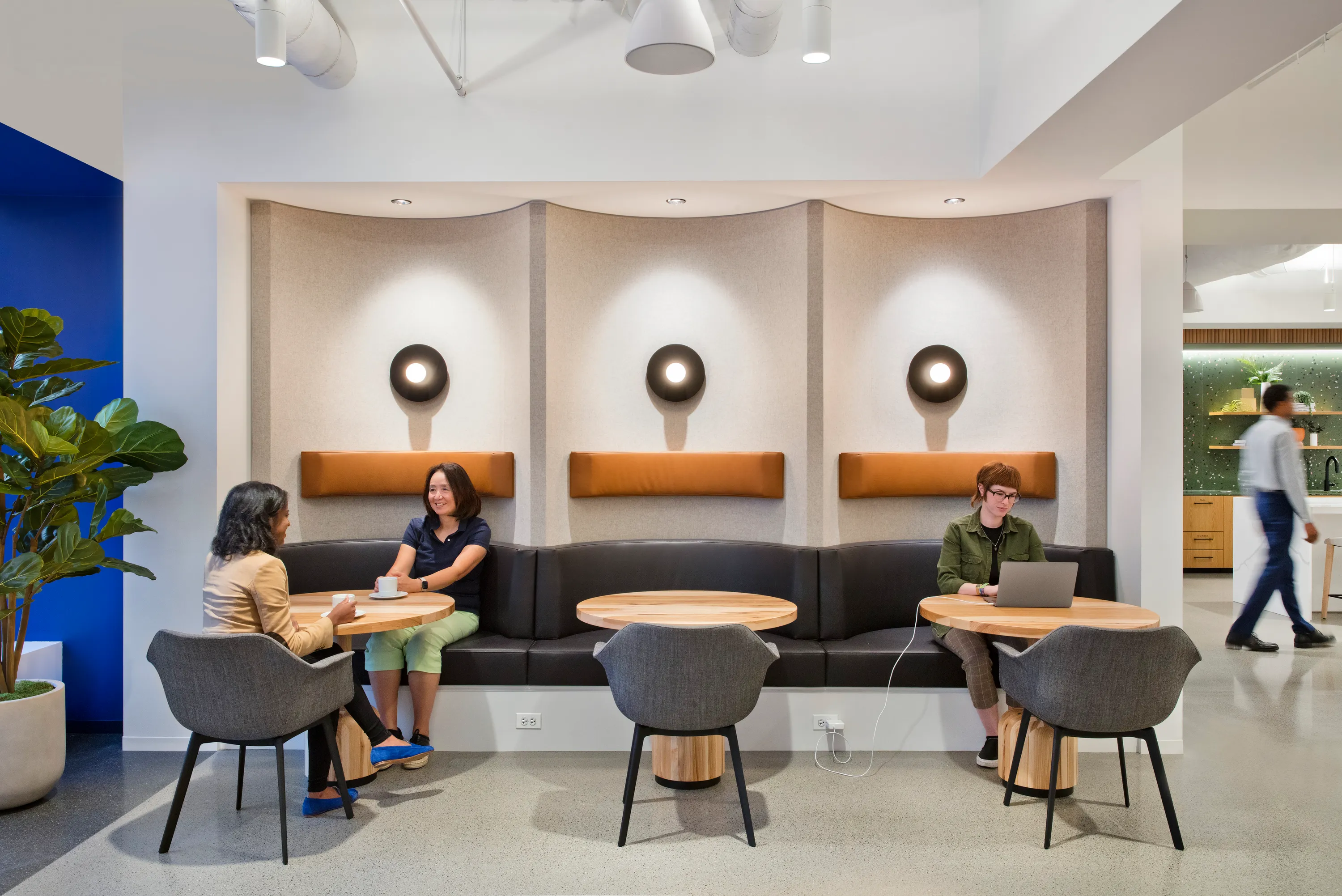 custom cafe tables in hickory hardwood with turned bases by Icon Modern