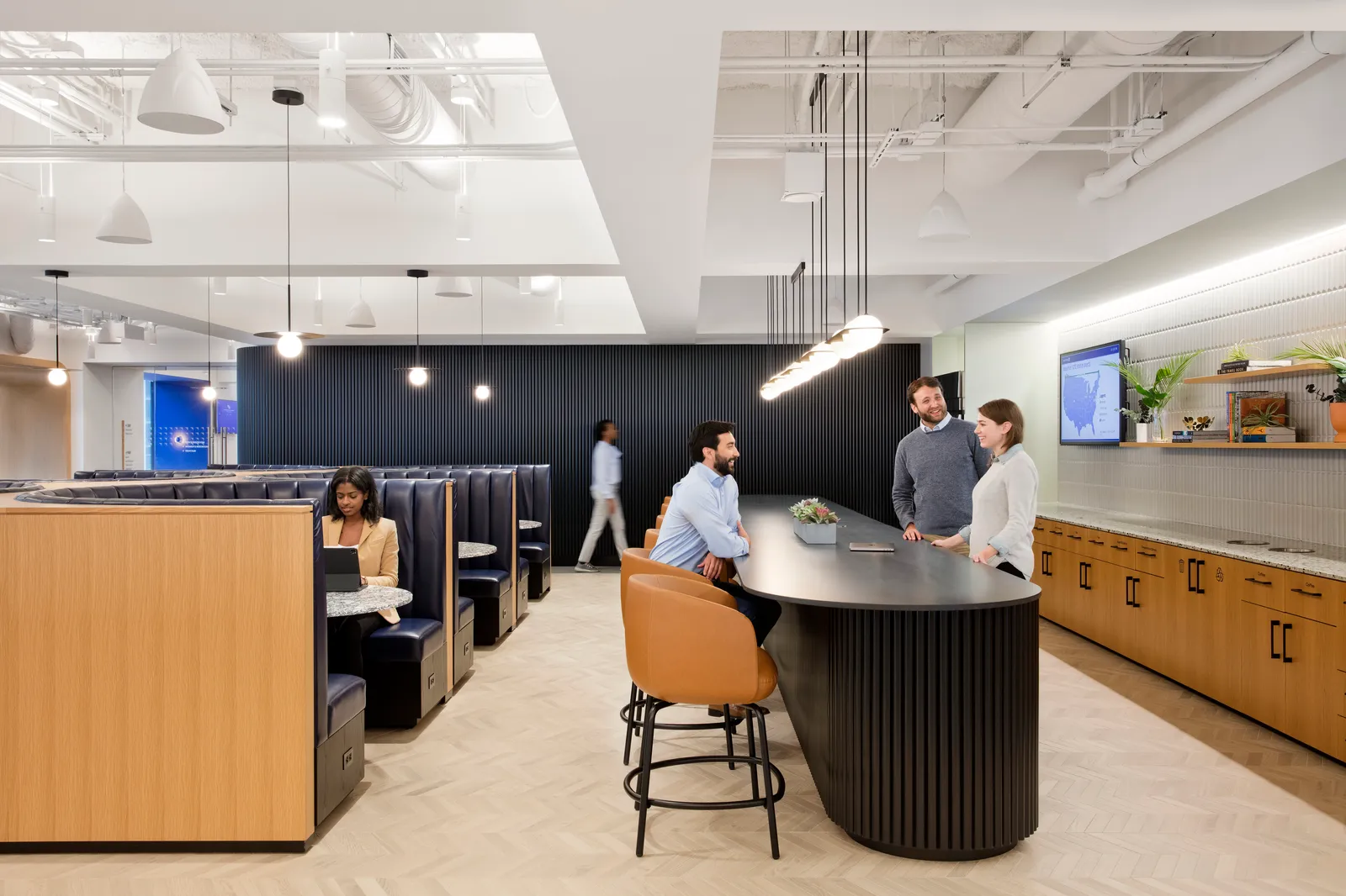 custom wood veneer banquette frame (left) by Icon Modern