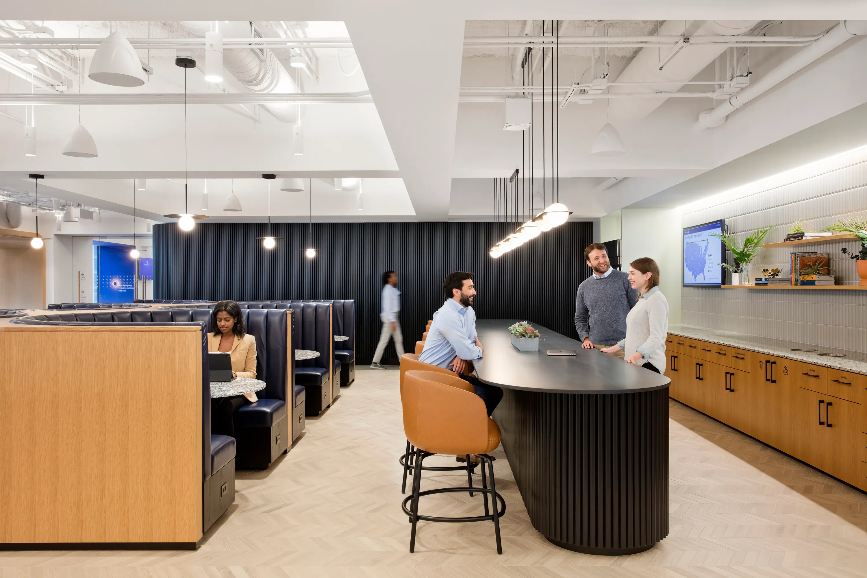 custom wood veneer banquette frame (left) by Icon Modern