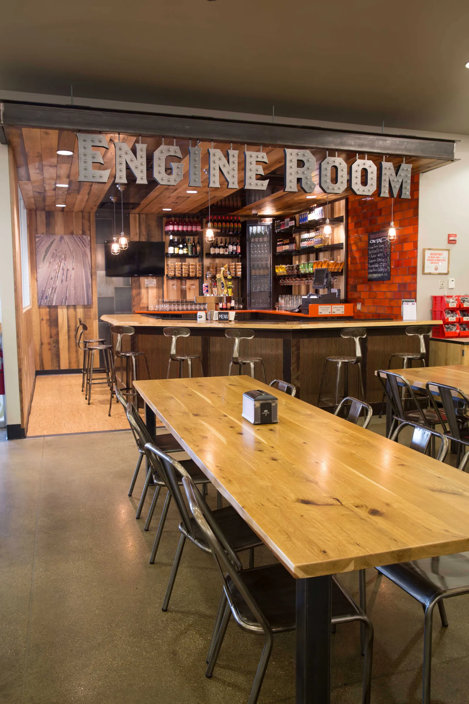 custom community tables in urban oak by Icon Modern