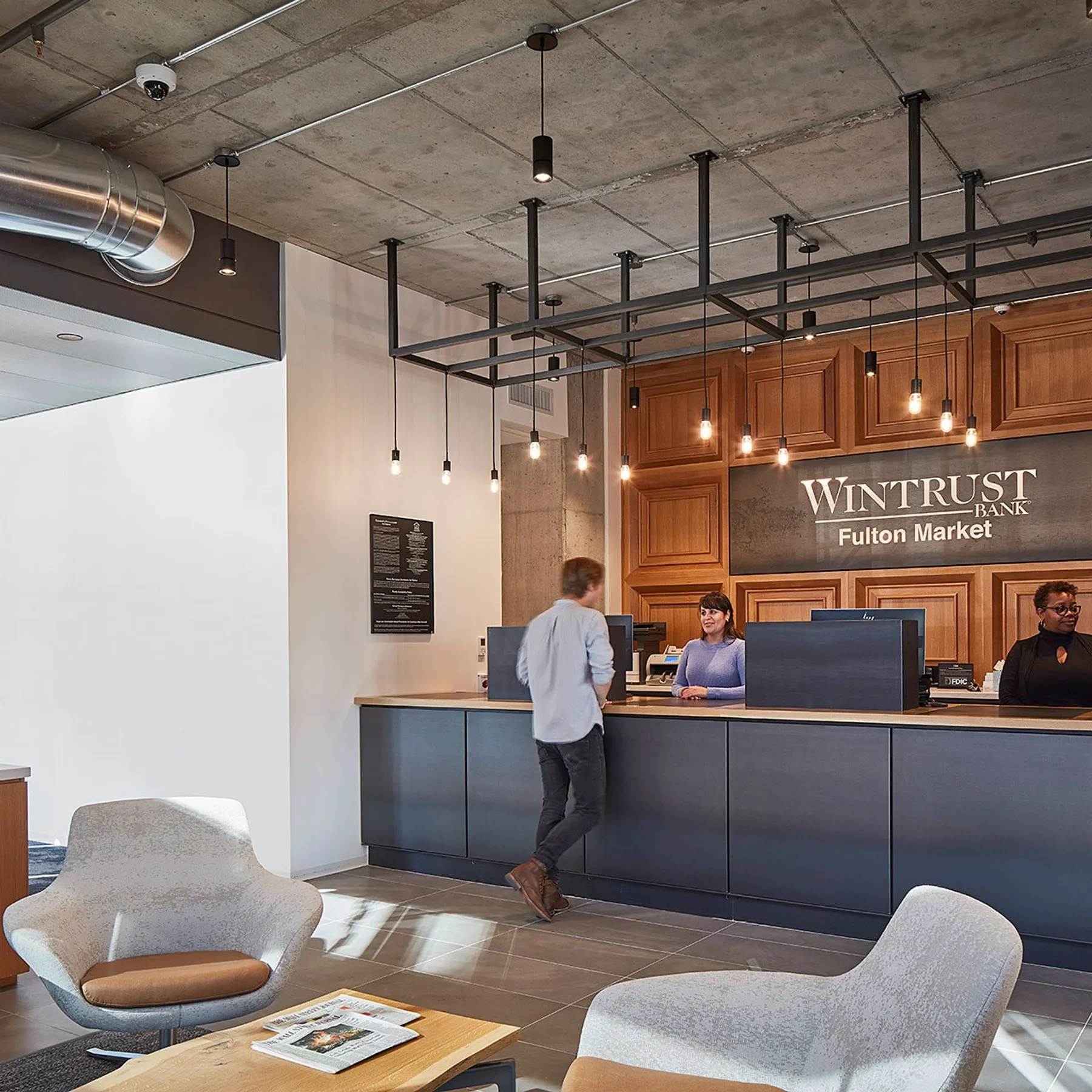 custom reception desk in steel plus branding signage by Icon Modern