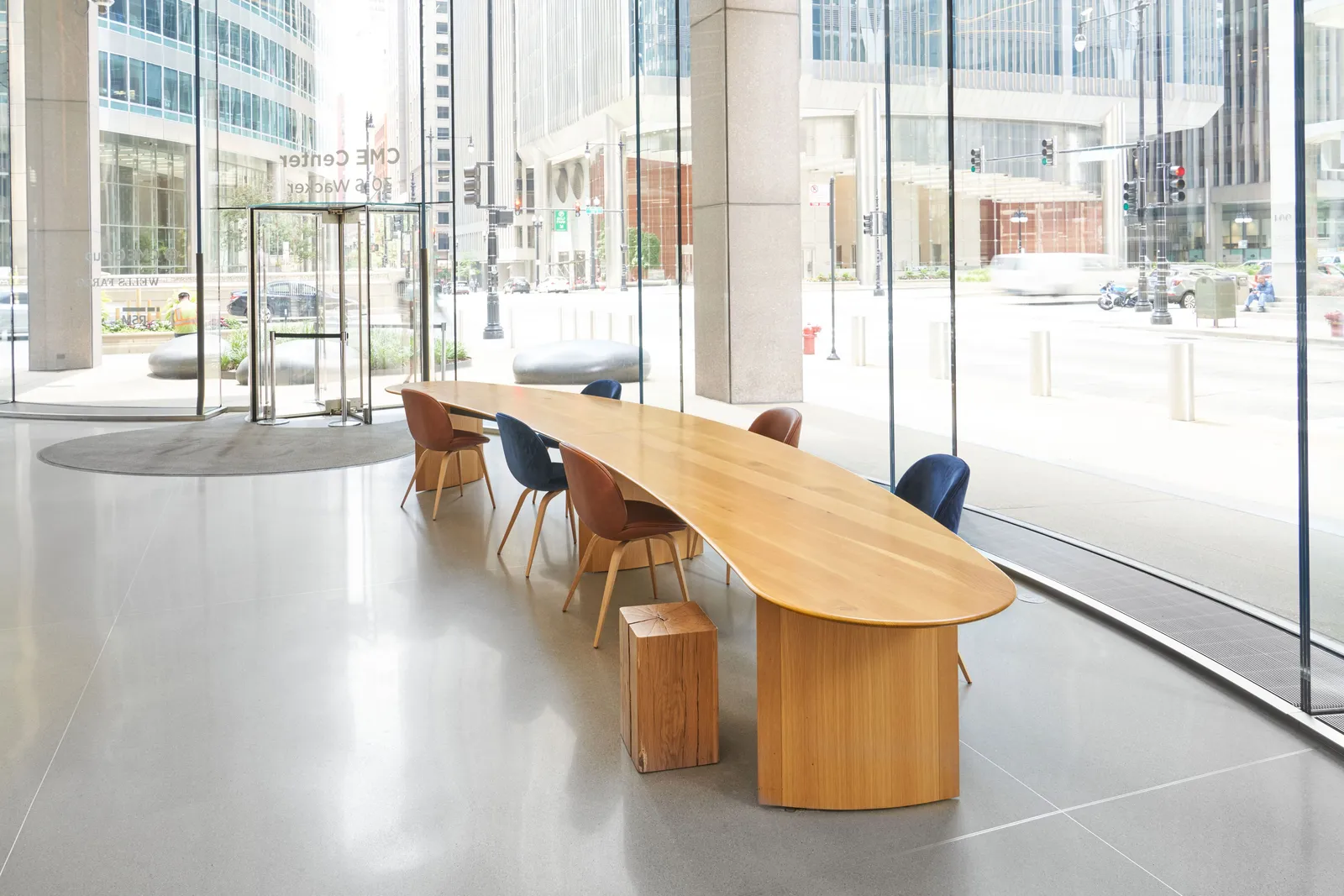 custom community table in urban oak by Icon Modern