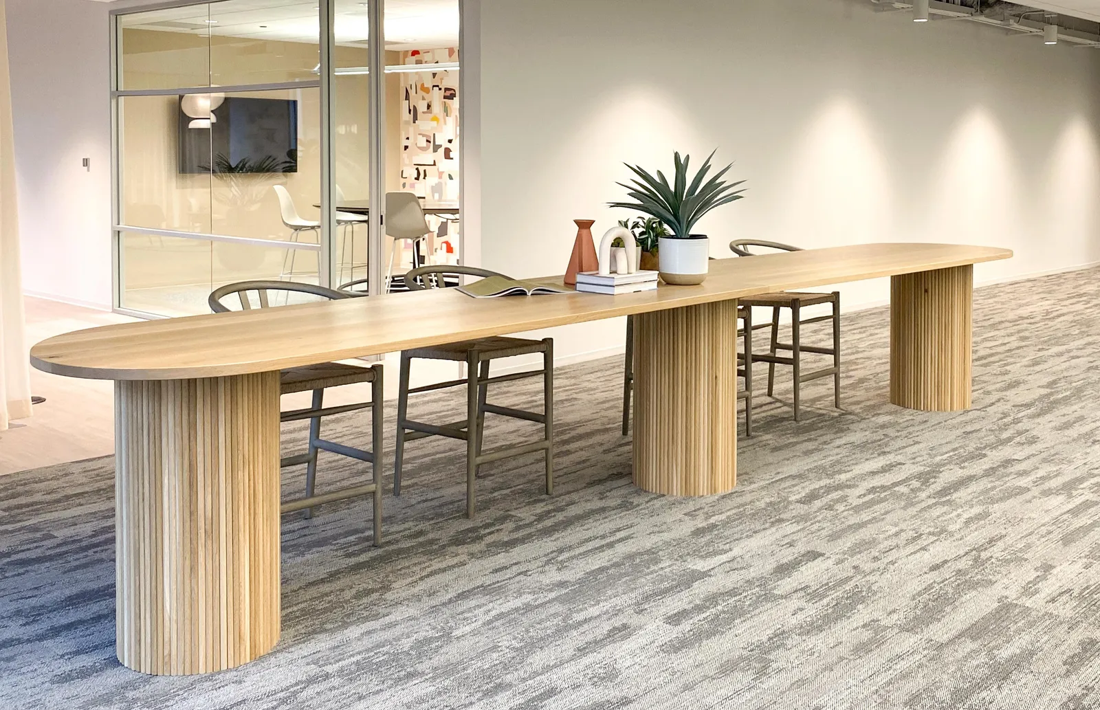 custom table in rift sawn oak and tambour drum base by Icon Modern