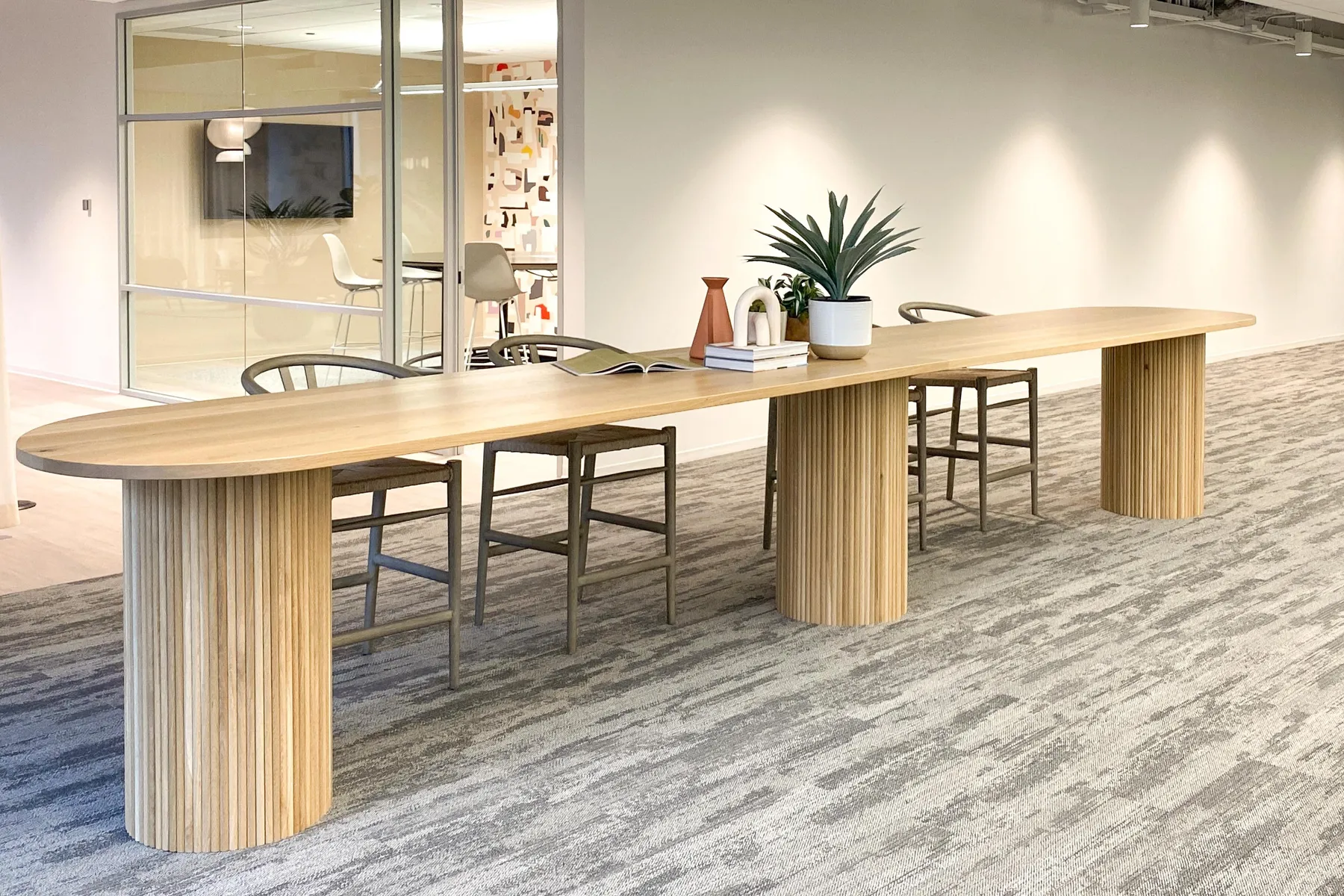 custom table in rift sawn oak and tambour drum base by Icon Modern