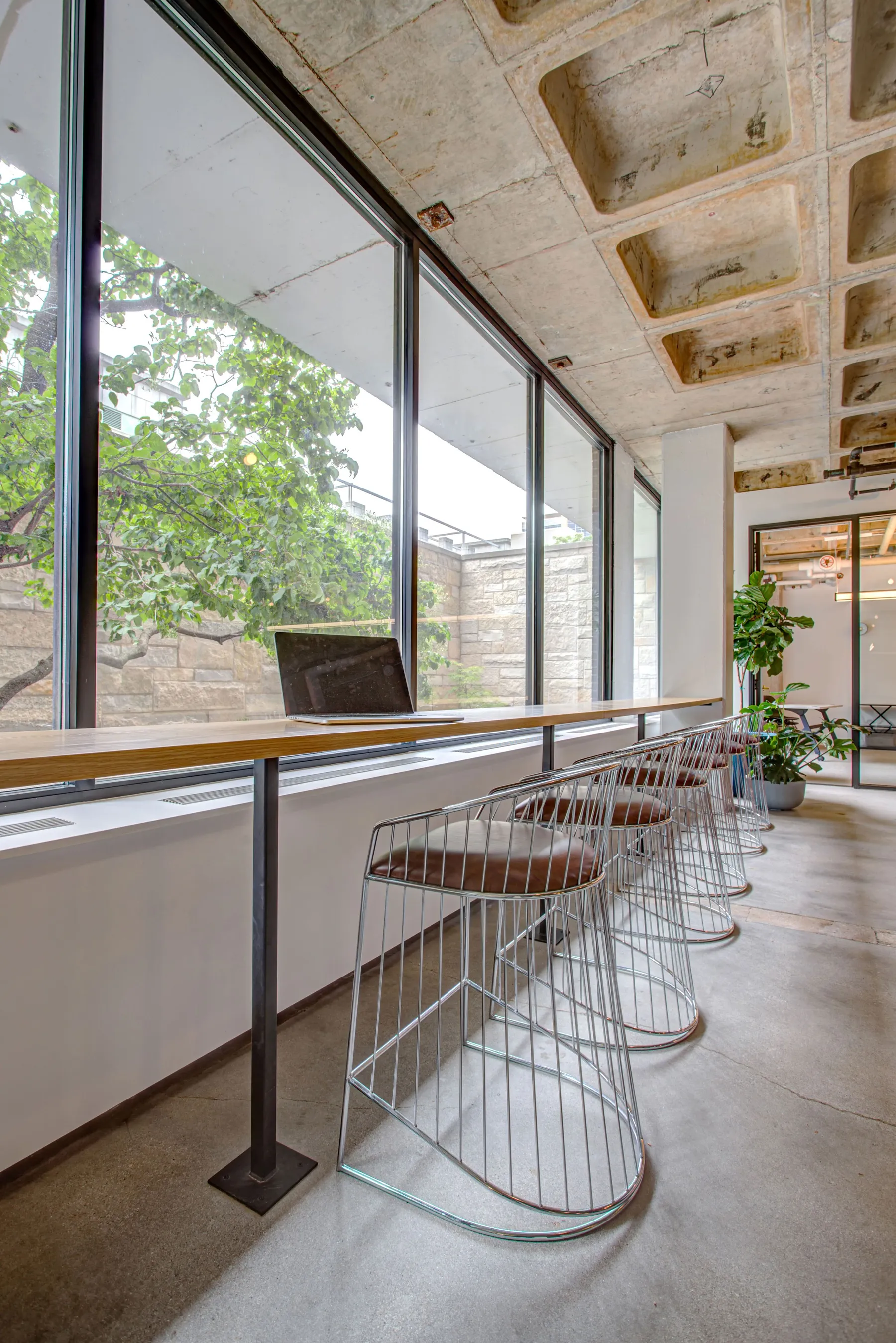 custom commercial counter with steel tube base by Icon Modern