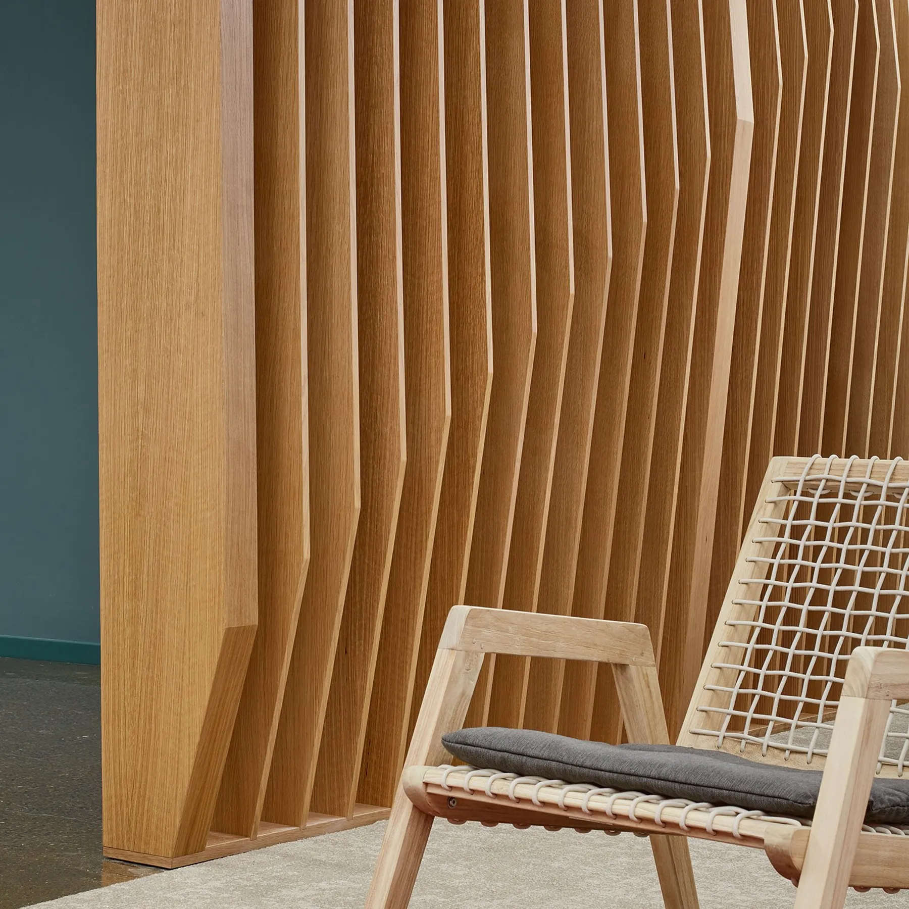 custom space divider in oak slats by Icon Modern
