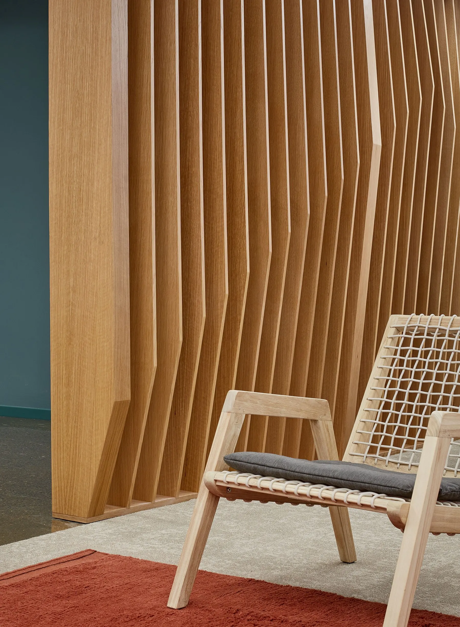 custom space divider in oak slats by Icon Modern